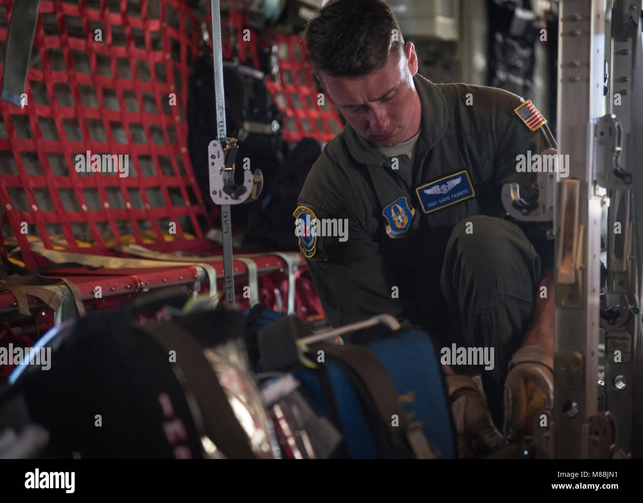 Staff Sgt. David Francis, 18th Aeromedical Evacuation (AE) Squadron AE  technician, secures medical equipment for a flight during exercise COPE  NORTH 2018, at Andersen Air Force Base, Guam, Feb. 19. COPE NORTH enhances  U.S. relations with regional allies and partners by demonstrating resolve to  promote security and stability throughout the Indo-Pacific. (U.S. Air Force Stock Photo