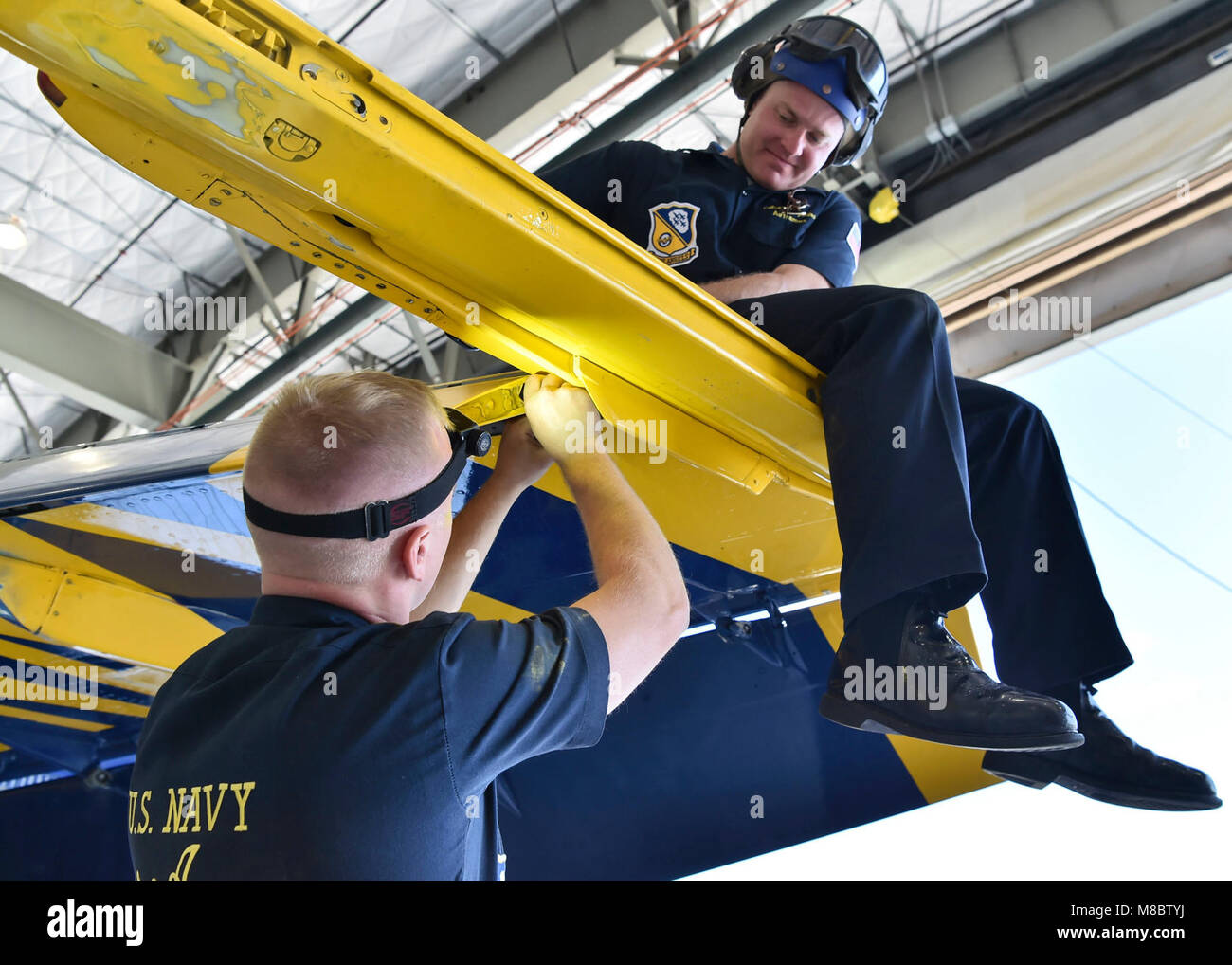 EL CENTRO, Calif. (Feb. 22, 2018) Aviation Structural Mechanic 1st Class, T.J. Dickey, and Aviation Structural Mechanic 1st Class, Joe Hopkins, perform maintenance on a leading edge flap . The Blue Angels are scheduled to perform more than 60 demonstrations at more than 30 locations across the U.S. in 2018. (U.S. Navy Stock Photo