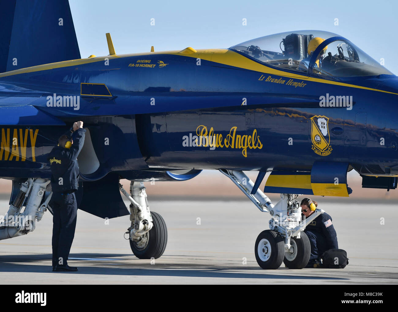 EL CENTRO, Calif. (Feb. 24, 2018) Blue Angels Crew Chief, Yeoman 2nd Class, Kyle Wood, and Aviation Machinist Mate 1st Class, Ali Erickson, recover a jet after a pratice demonstration. The Blue Angels are scheduled to perform more than 60 demonstrations at more than 30 locations across the U.S. in 2018. (U.S. Navy Stock Photo