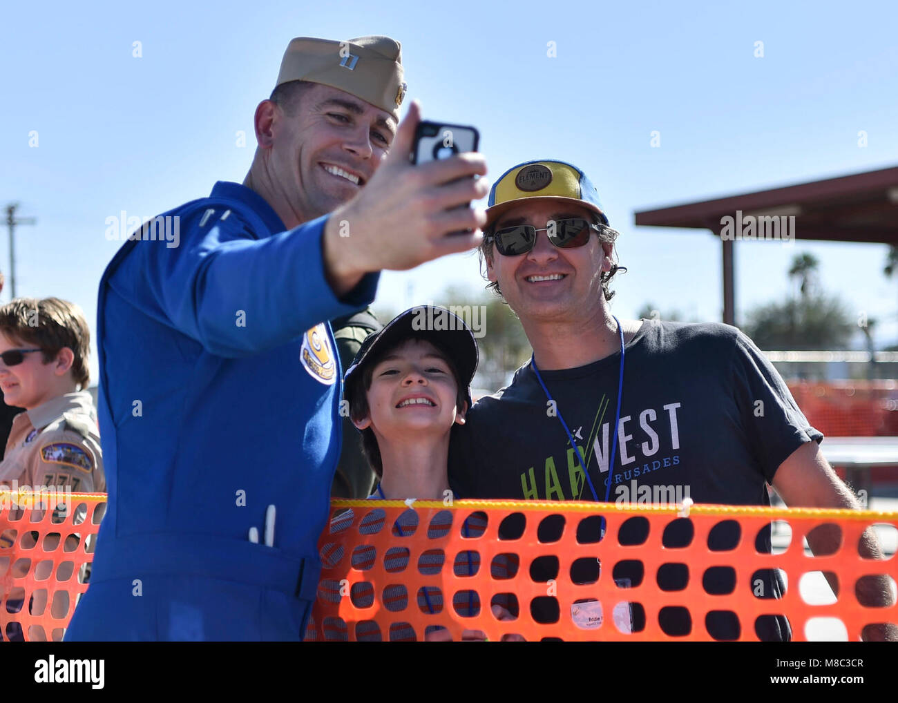 EL CENTRO, Calif. (Feb. 24, 2018) Blue Angels Right Wing Pilot, Lt. Damon Kroes, takes a selfie with fans following a practice demonstration. The Blue Angels are scheduled to perform more than 60 demonstrations at more than 30 locations across the U.S. in 2018. (U.S. Navy Stock Photo