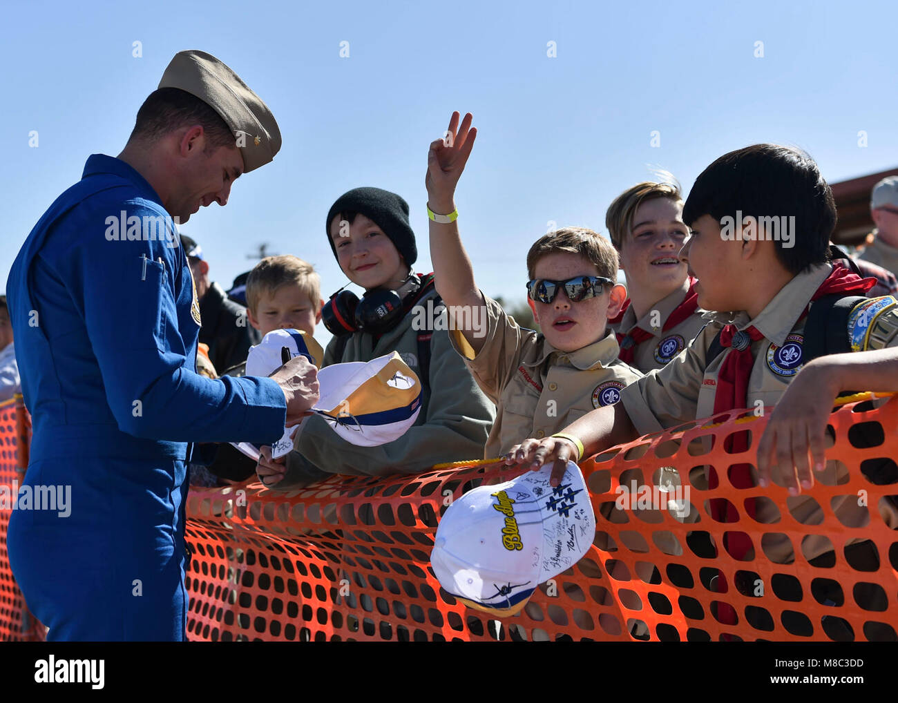 NAF EL CENTRO, Calif. (Feb. 24, 2018) Blue Angels Left Wing Pilot, Maj. Jeff Mullins, signs autographs for local Boy Scouts following a practice demonstration. The Blue Angels are scheduled to perform more than 60 demonstrations at more than 30 locations across the U.S. in 2018. (U.S. Navy Stock Photo