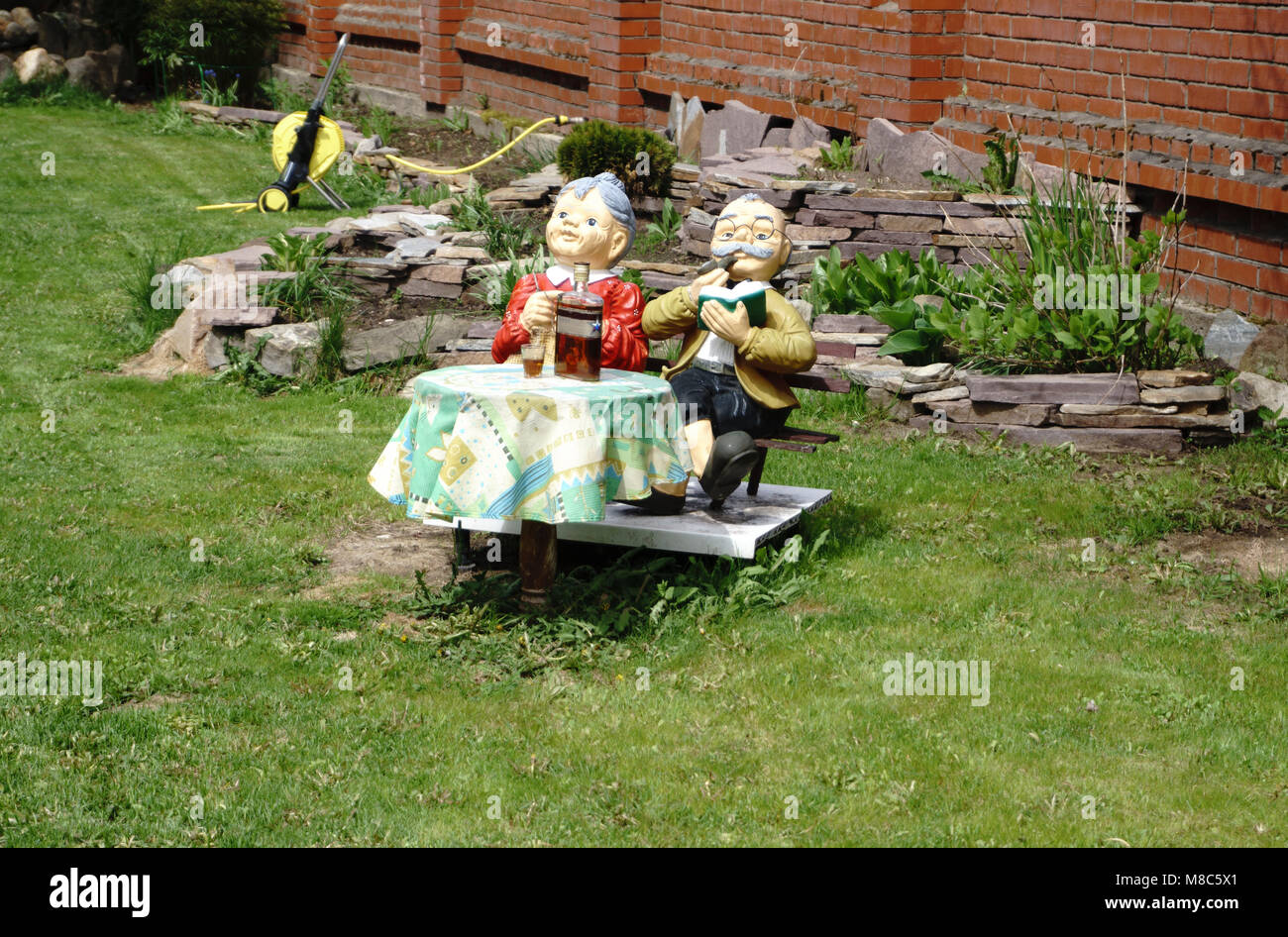 The wooden figure of the person for decoration of a garden or giving Stock Photo