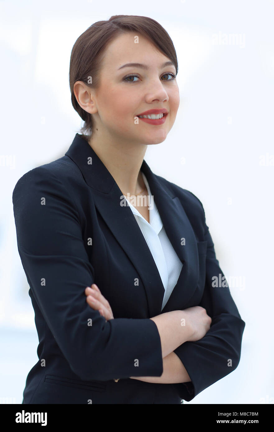 successful young business woman on the background of the office Stock ...