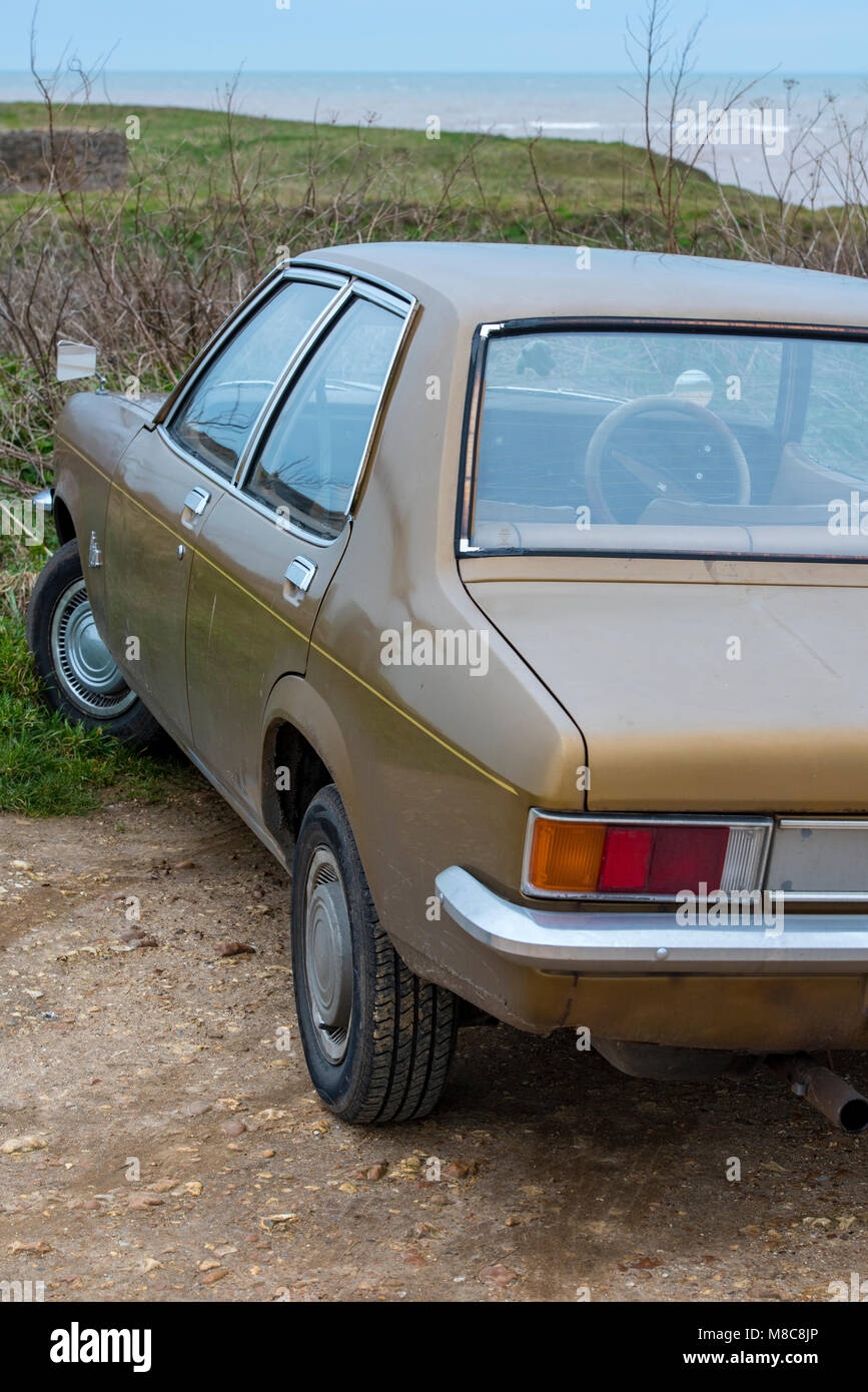a vintage vauxhall motor car in brown colour. historic and collectors cars for retro and 1970's vintage motoring. driving classic cars and automobiles Stock Photo
