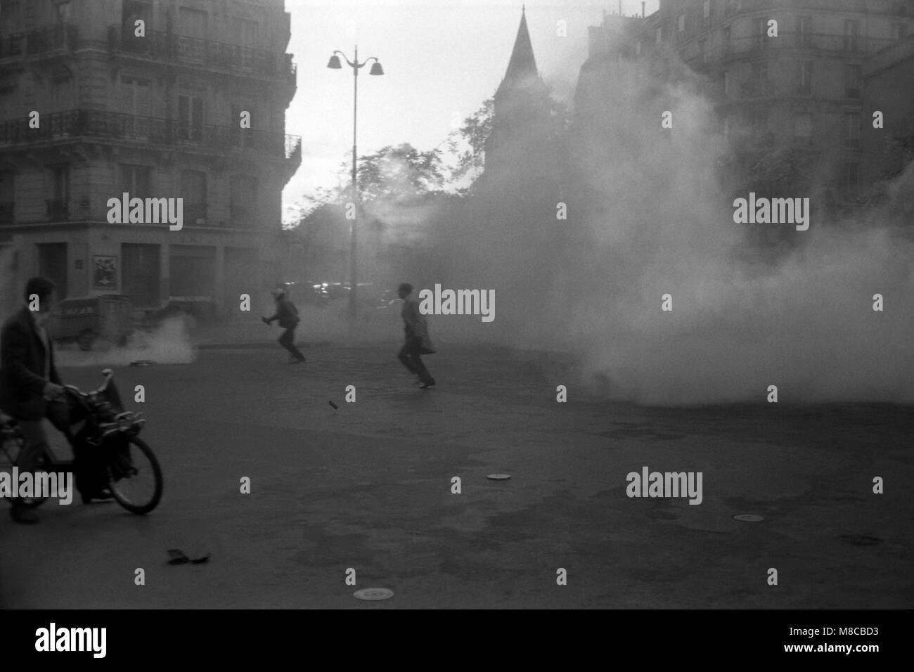 Philippe Gras / Le Pictorium -   -  1968  -  France / Ile-de-France (region) / Paris  -  Tear gas against pavement in the streets of Paris Stock Photo