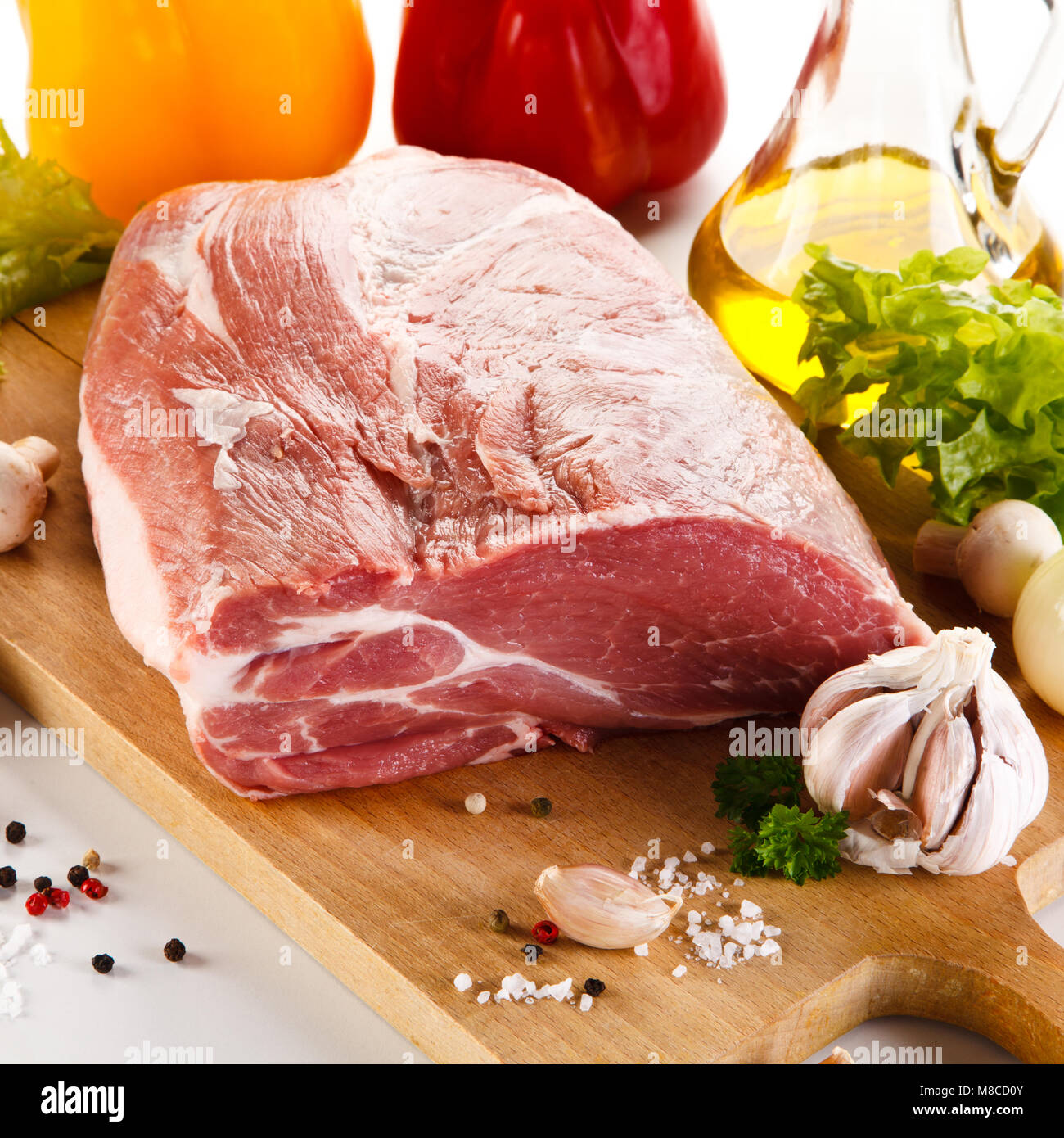 Raw pork on cutting board Stock Photo