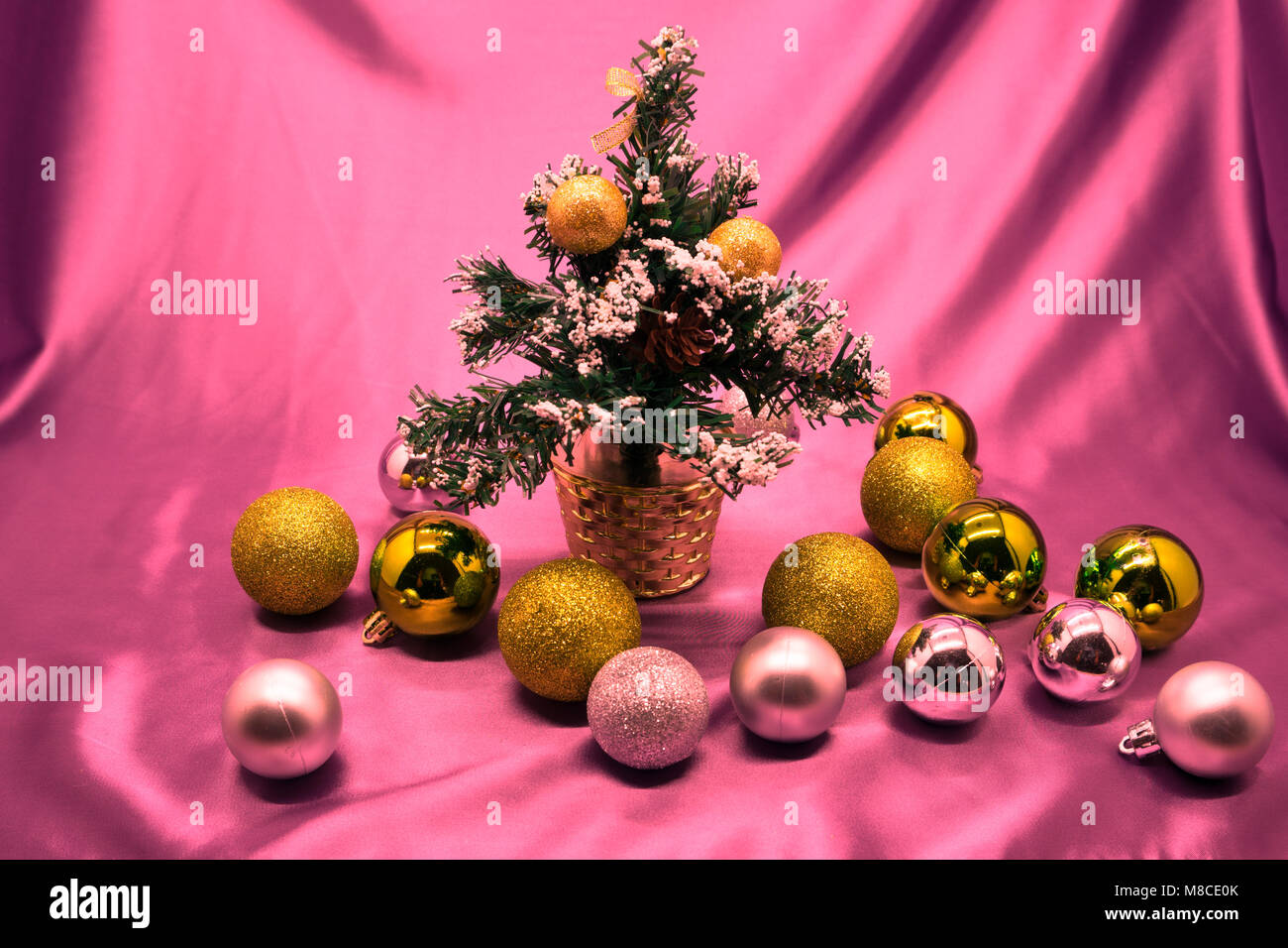 Great beautiful Christmas tree decorated with pink balloons, ribbons ...