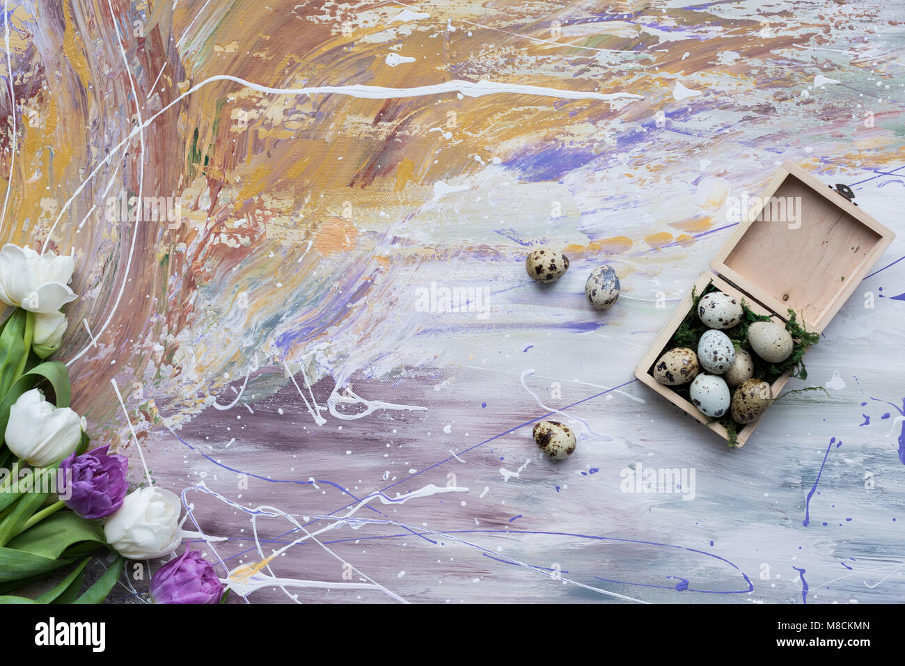 Quail eggs in box and tulips on stained background Stock Photo - Alamy