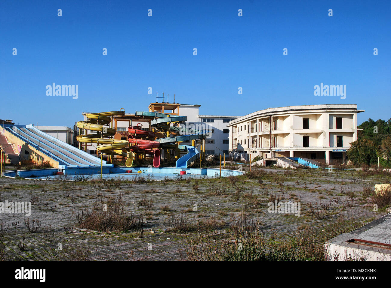 Swimming pool in Villaggio Coppola. The construction of the village is an example of illegal building on a large scale - Castel Volturno, Italy Stock Photo