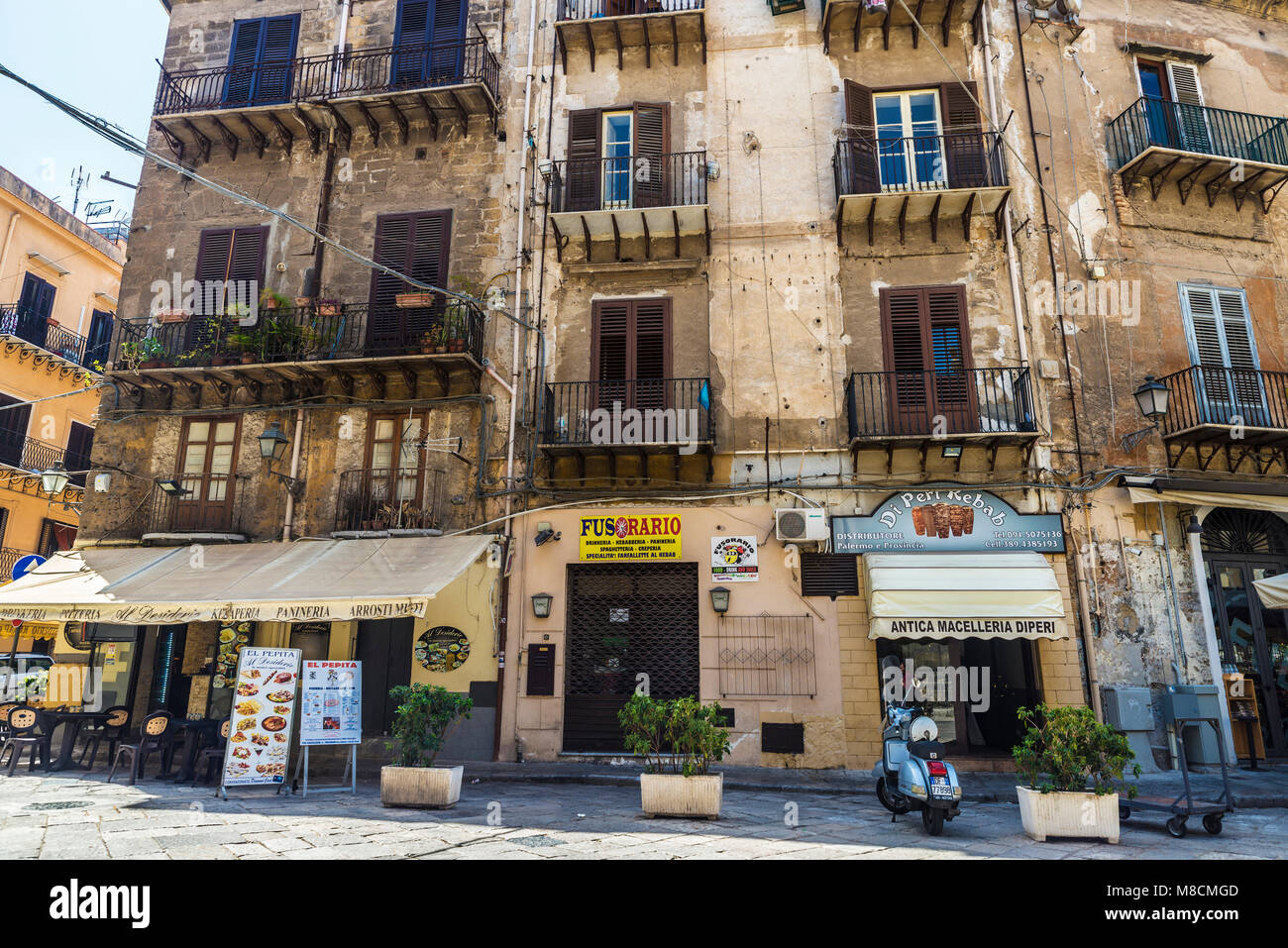 Palermo, Italy - August 10, 2017: Terrace of a restaurant bar in the old town of Palermo in Sicily, Italy Stock Photo