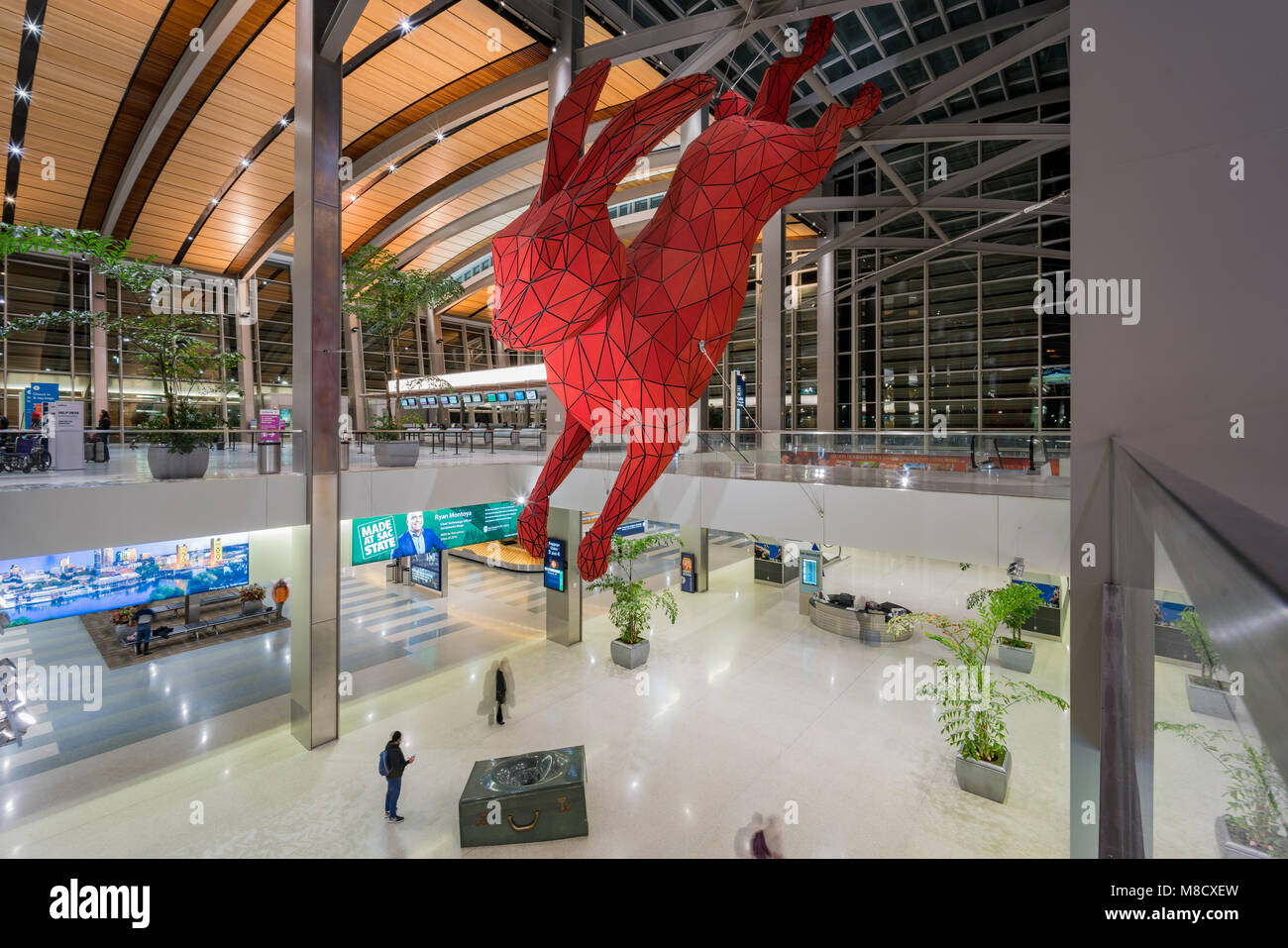 Sacramento, FEB 20: Night view of the Big red rabbit art hanging at the airport on FEB 20, 2018 at Sacramento, California Stock Photo