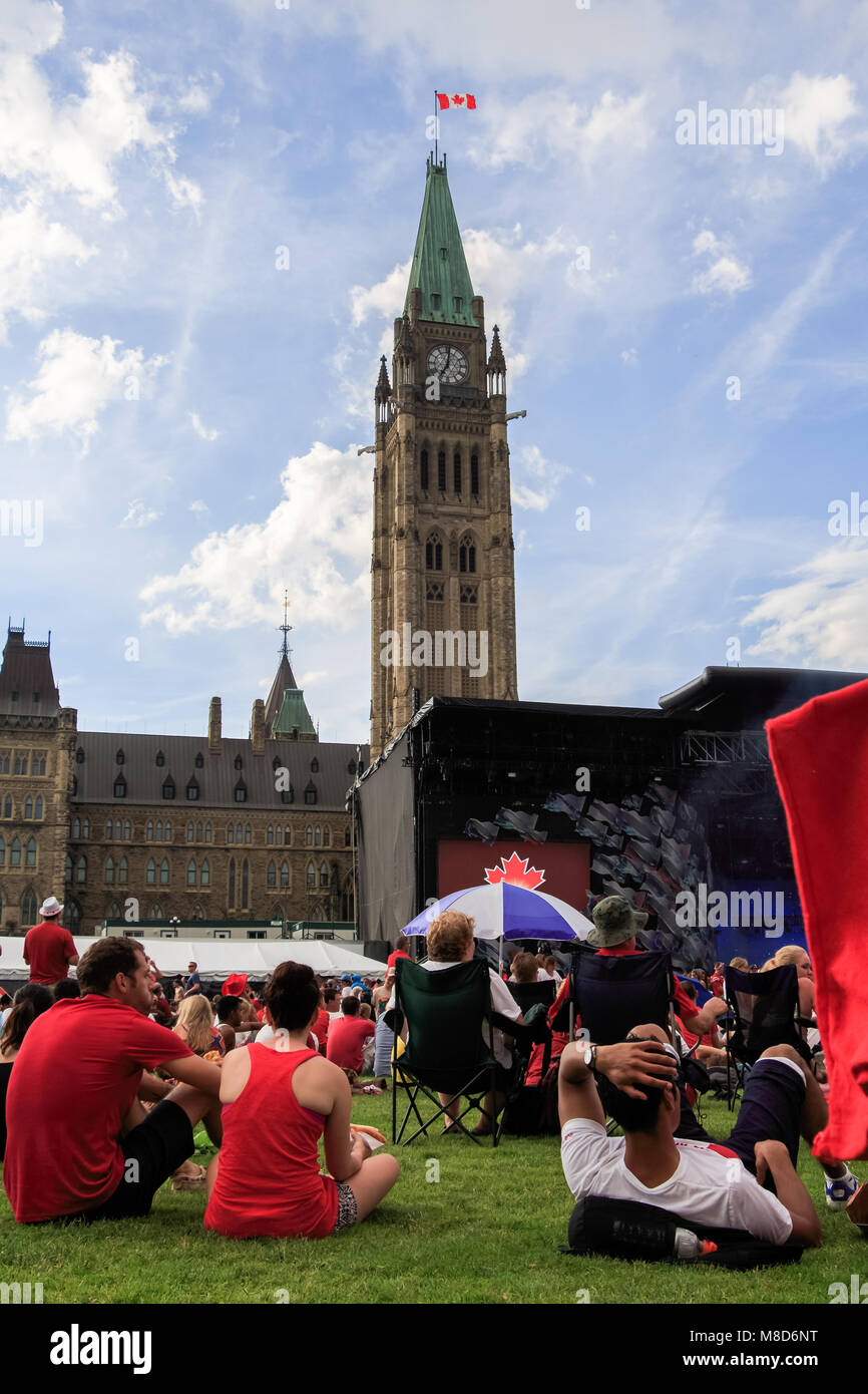 Ottawa, ON, Canada - July 1st 2014: People Gather for Canada Day on Parliament Hill Stock Photo