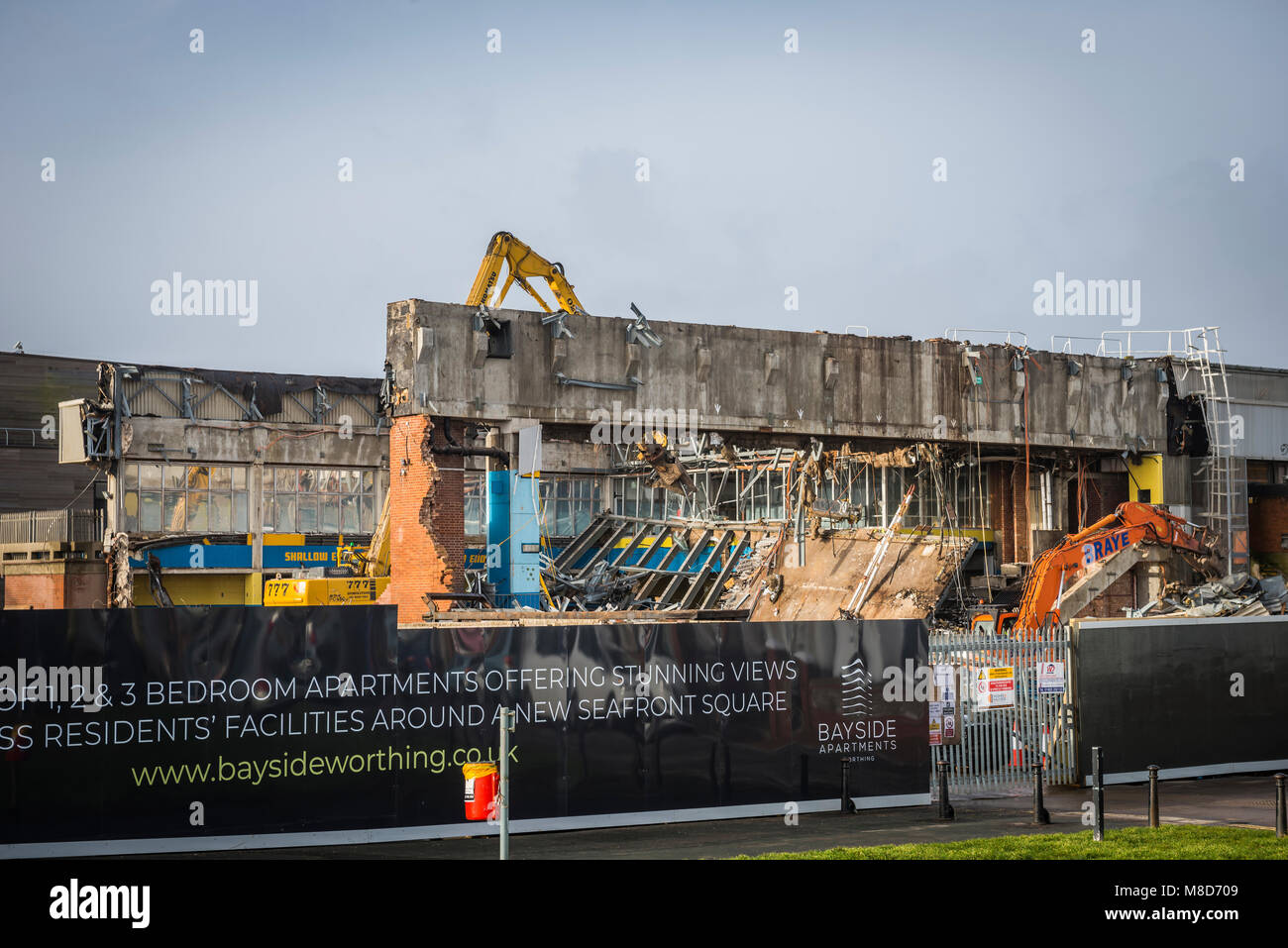 Demolition of the old Aquarena Swimming Pool in Worthing, West Sussex to make way for luxury seafront flats. Stock Photo