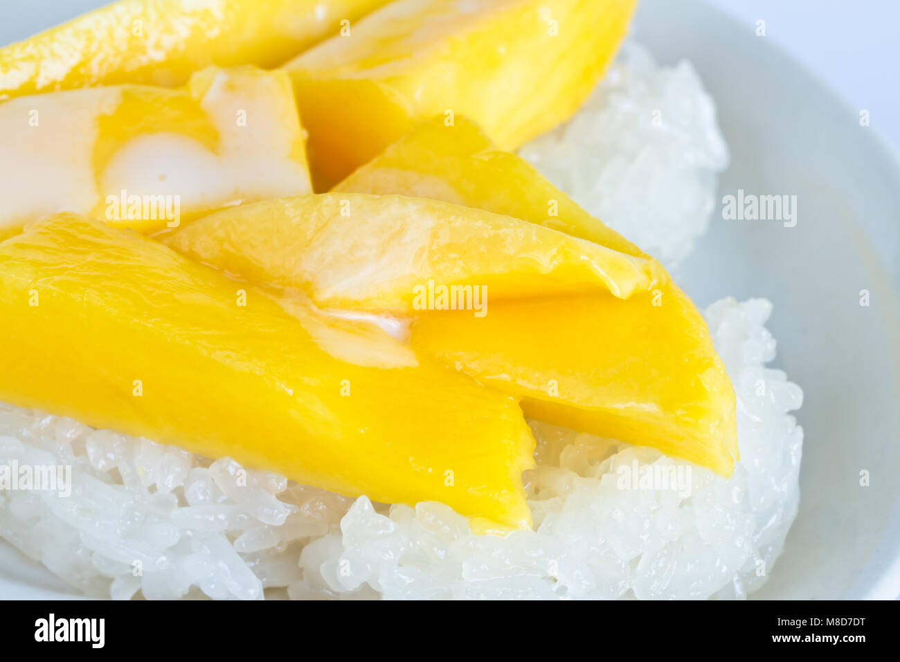 Sticky Rice with Mango on dish Stock Photo - Alamy