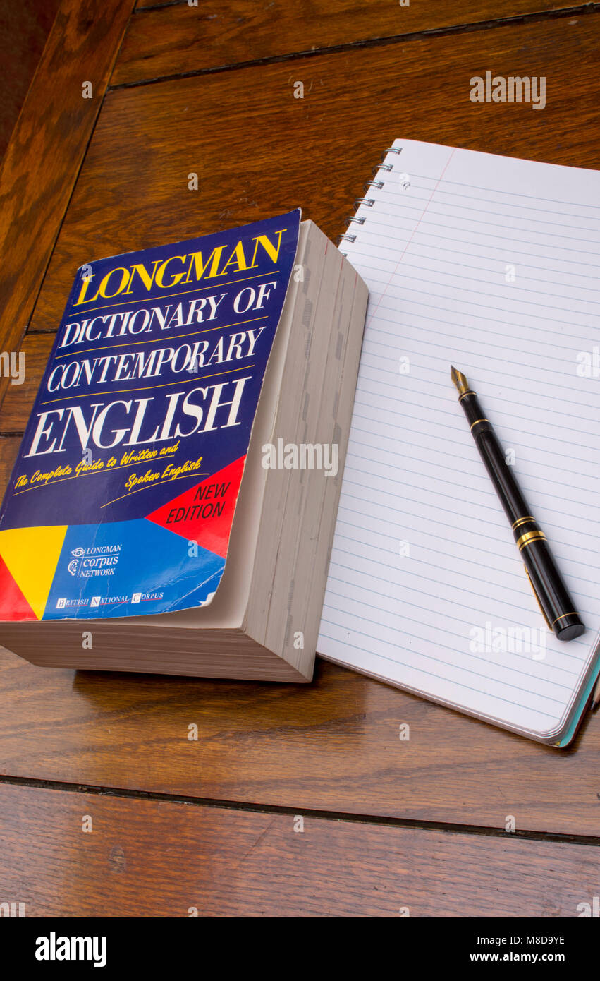Longman Dictionary of Contemporary English with notepad and parker fountain pen Stock Photo