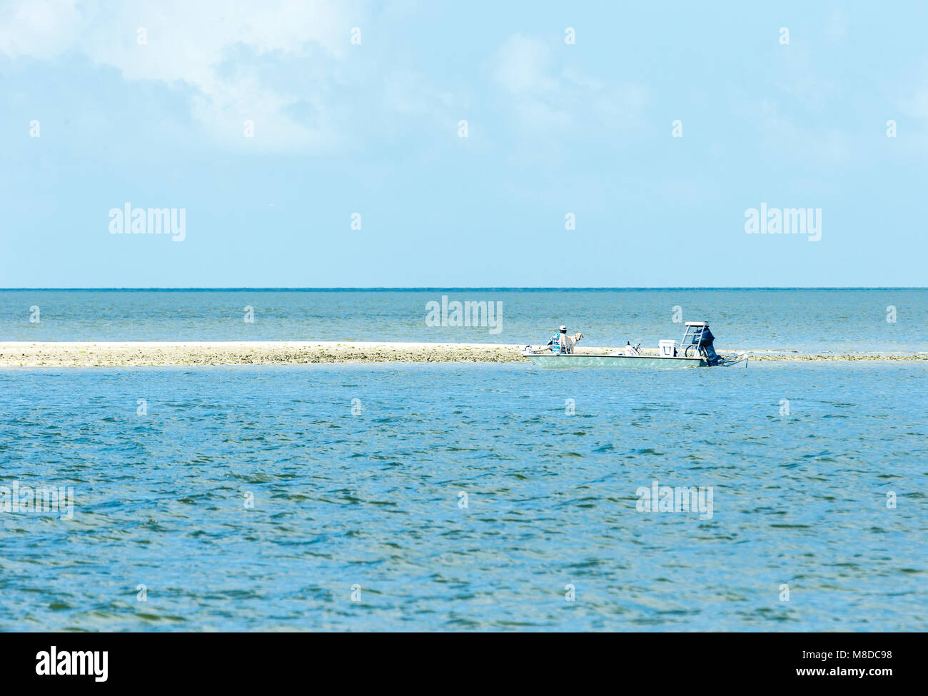 Ten Thousand Islands, Florida - March 02, 2018: Fisherman on a sandbar at Ten Thousand Islands, Everglades, Florida Stock Photo