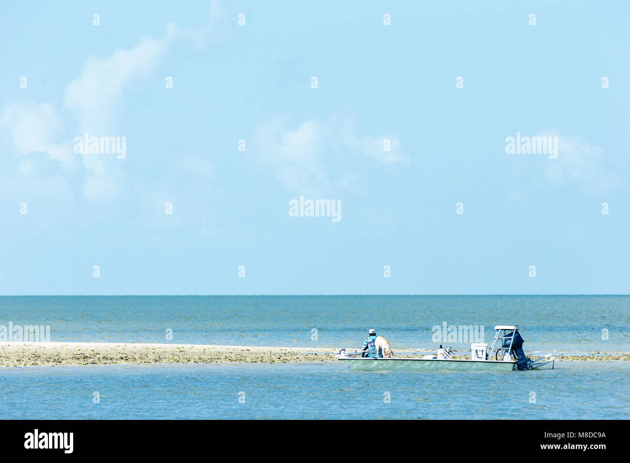 Ten Thousand Islands, Florida - March 02, 2018: Fisherman on a sandbar at Ten Thousand Islands, Everglades, Florida Stock Photo