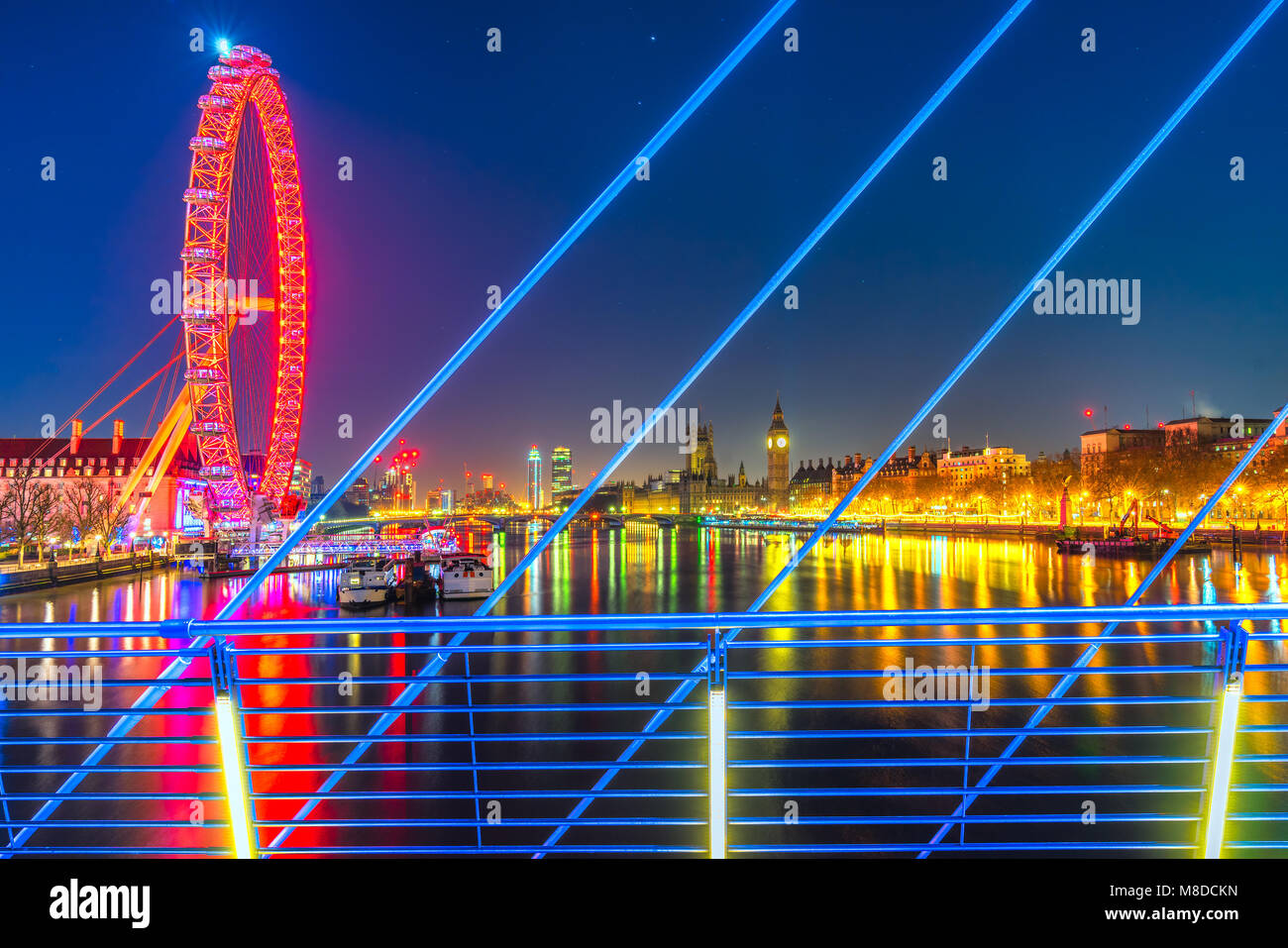 The view of the London Eye, River Thames and Big Ben from the Golden  Jubilee Bridge stock photo - OFFSET