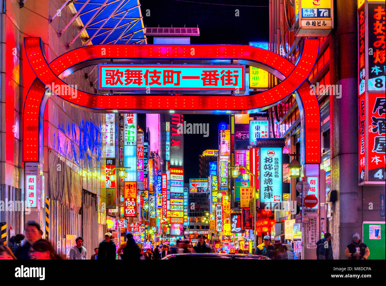 TOKYO - NOVEMBER 13: Billboards in Shinjuku's Kabuki-cho district November 13, 2014 in Tokyo, JP. The area is a nightlife district known as Sleepless  Stock Photo