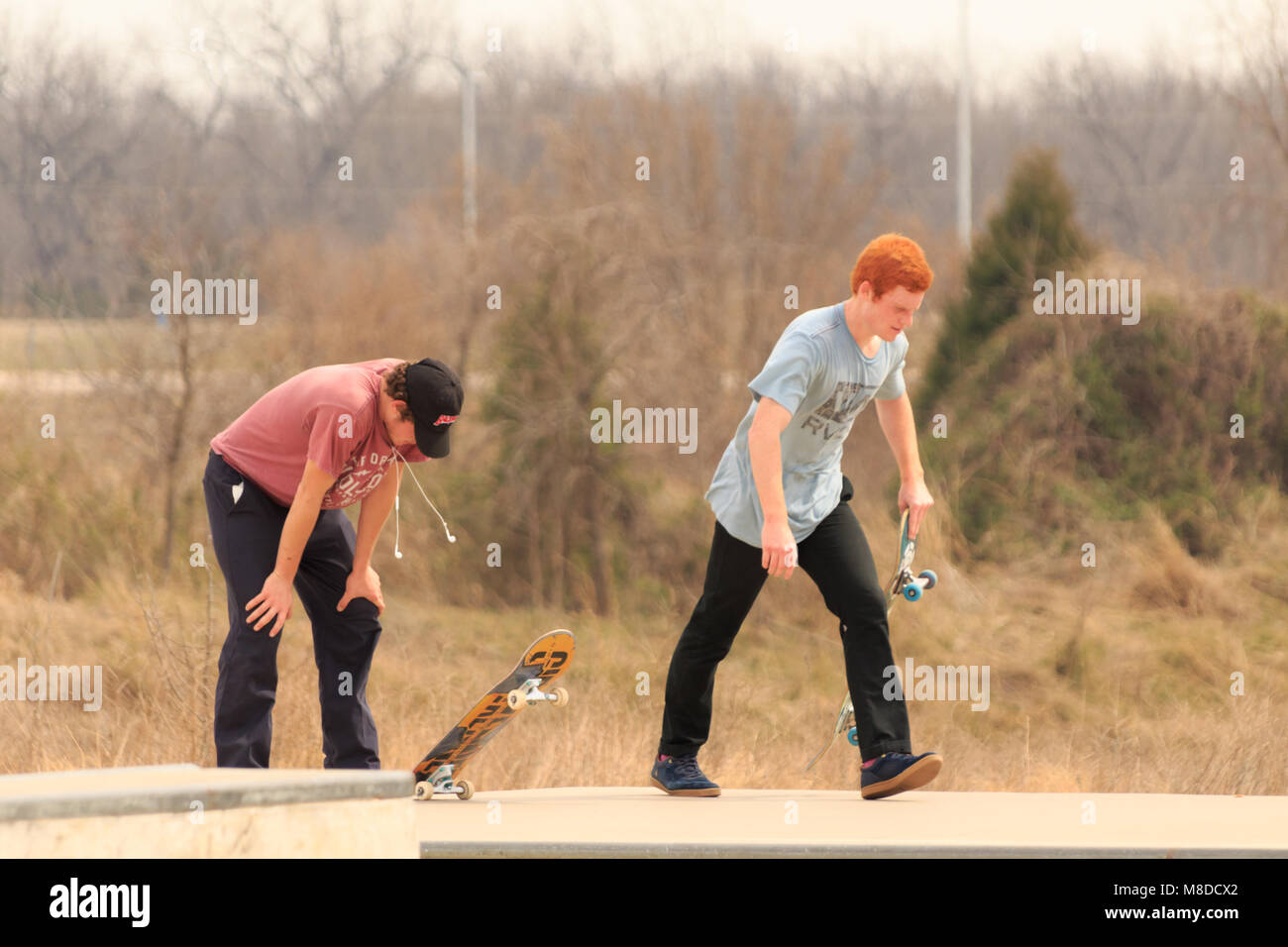 Tulsa, Oklahoma, March 2018, A couple unknown young men Skate Boarding at a local park in Tulsa, Oklahoma 2018 Stock Photo