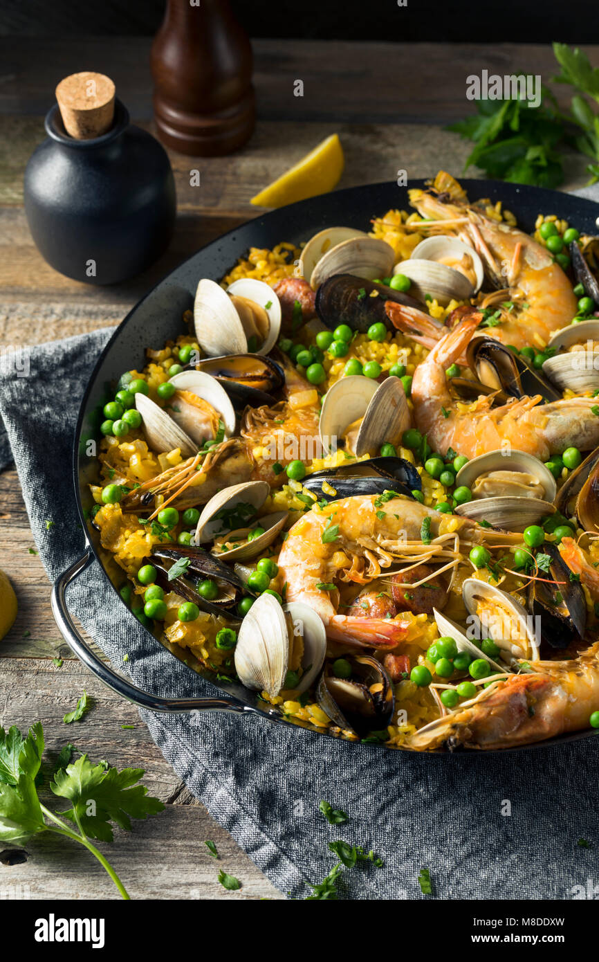 Homemade Spanish Seafood Paella with Prawns Mussels and Clams Stock Photo