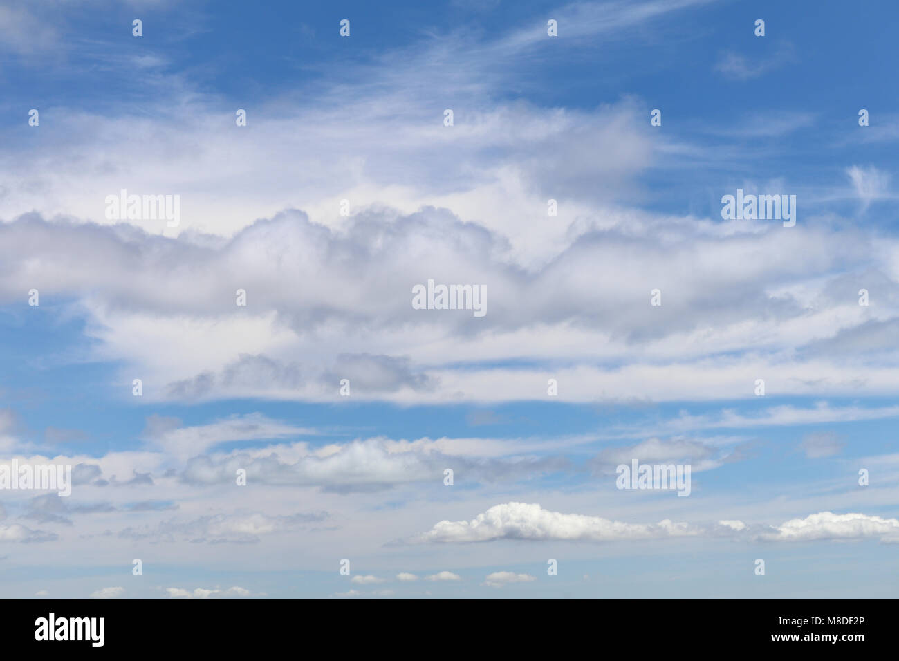 Fluffy white clouds Stock Photo - Alamy