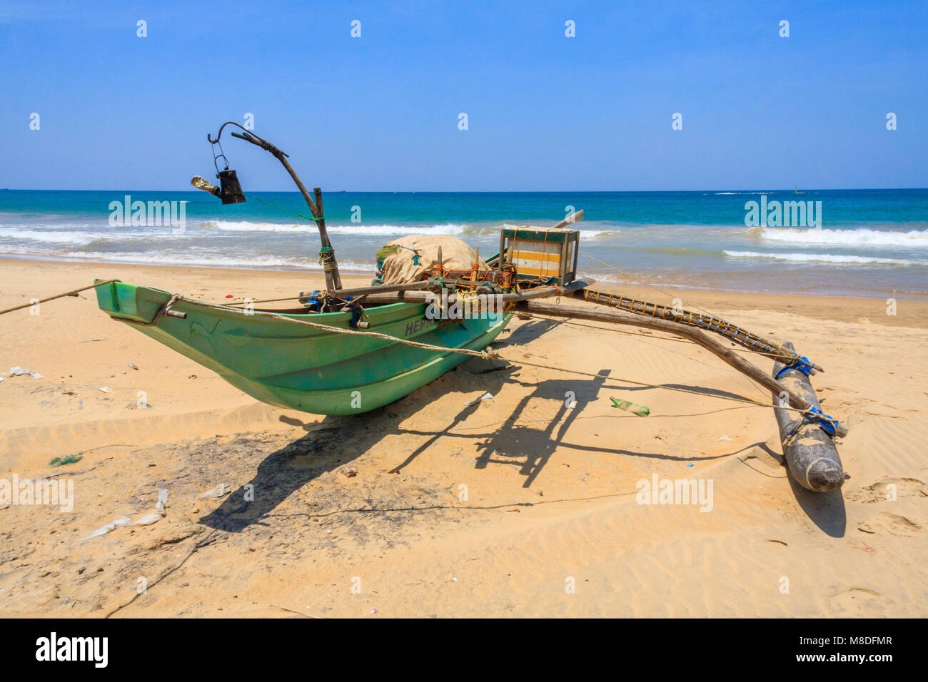 Traditional, Sri Lankan fishing boat, beach, COlombo, Sri Lanka Stock Photo