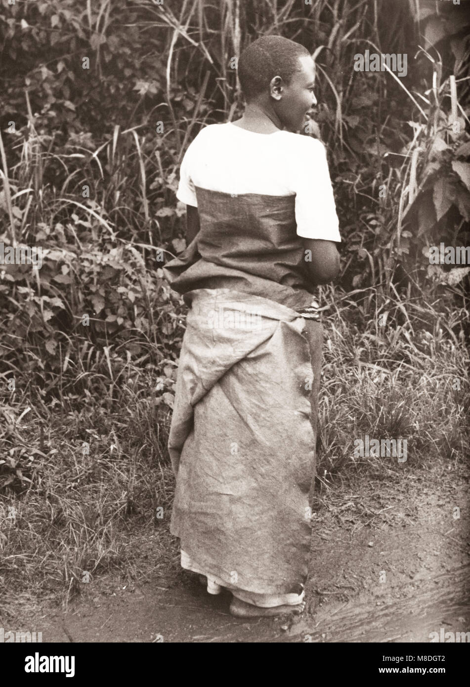 1940s East Africa - Uganda - Baganda woman in a traditional bark cloth or barkcloth dress Stock Photo