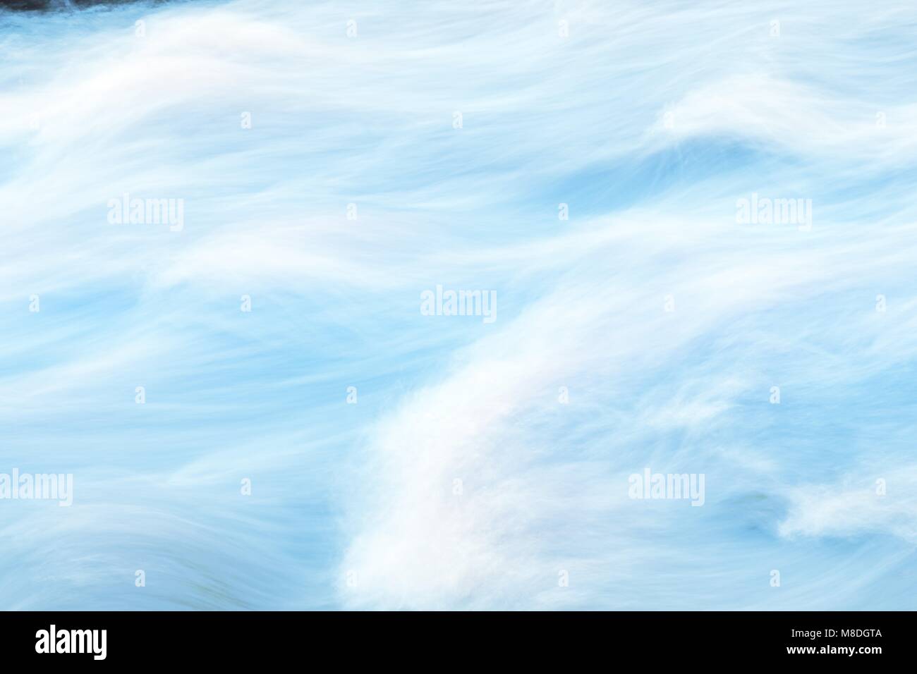 Flowing water abstract, wave motion background Stock Photo - Alamy