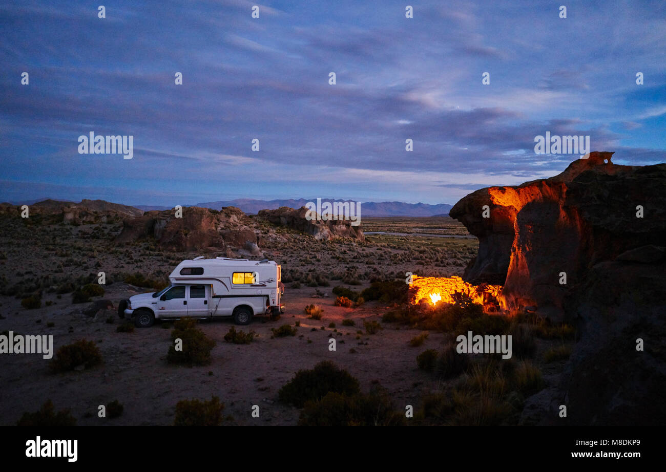 Recreational vehicle, travelling at dusk, Oruro, Oruro, Bolivia, South America Stock Photo