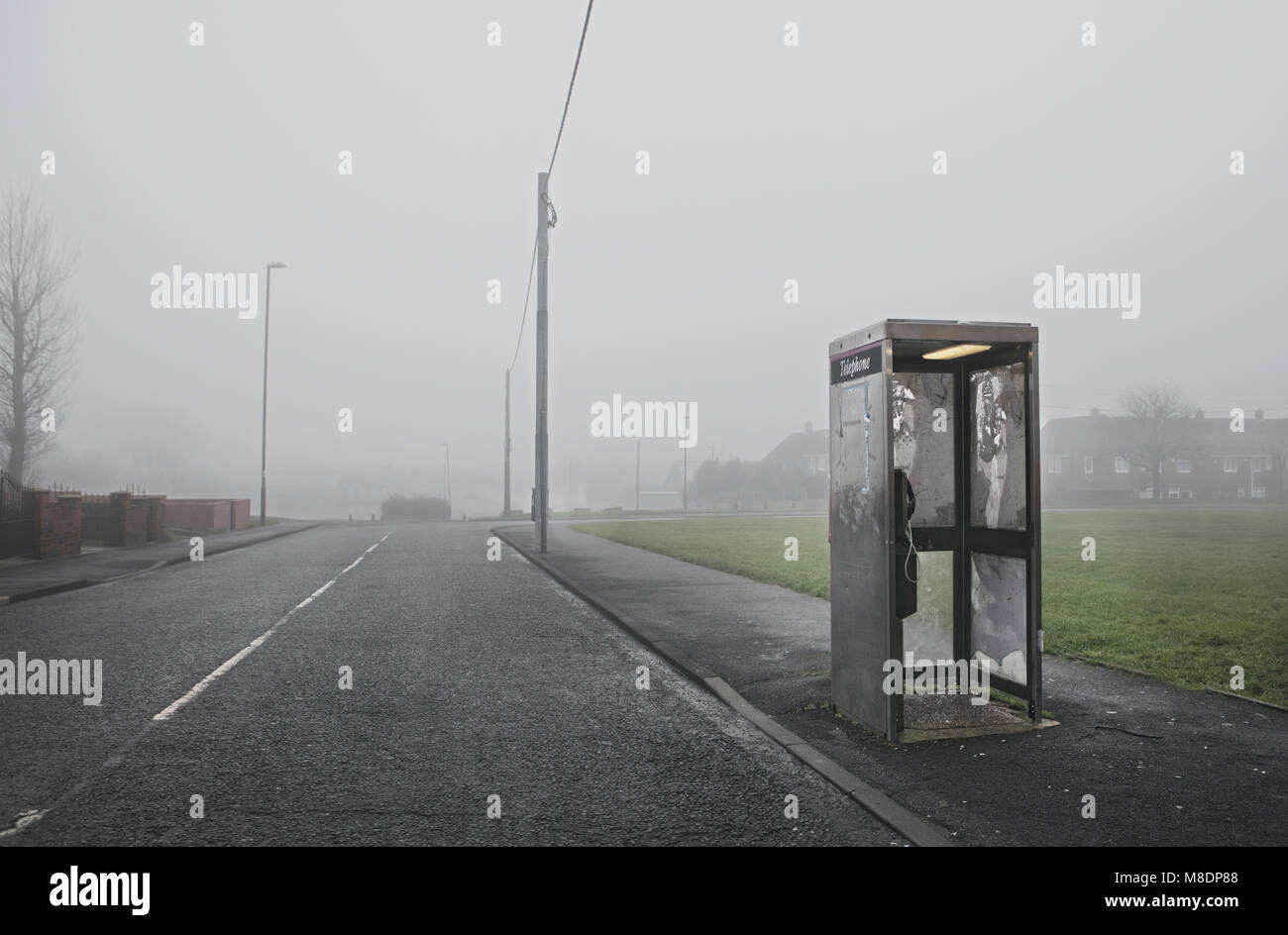 Phone box along roadside, Houghton-le-Spring, Sunderland, UK Stock Photo