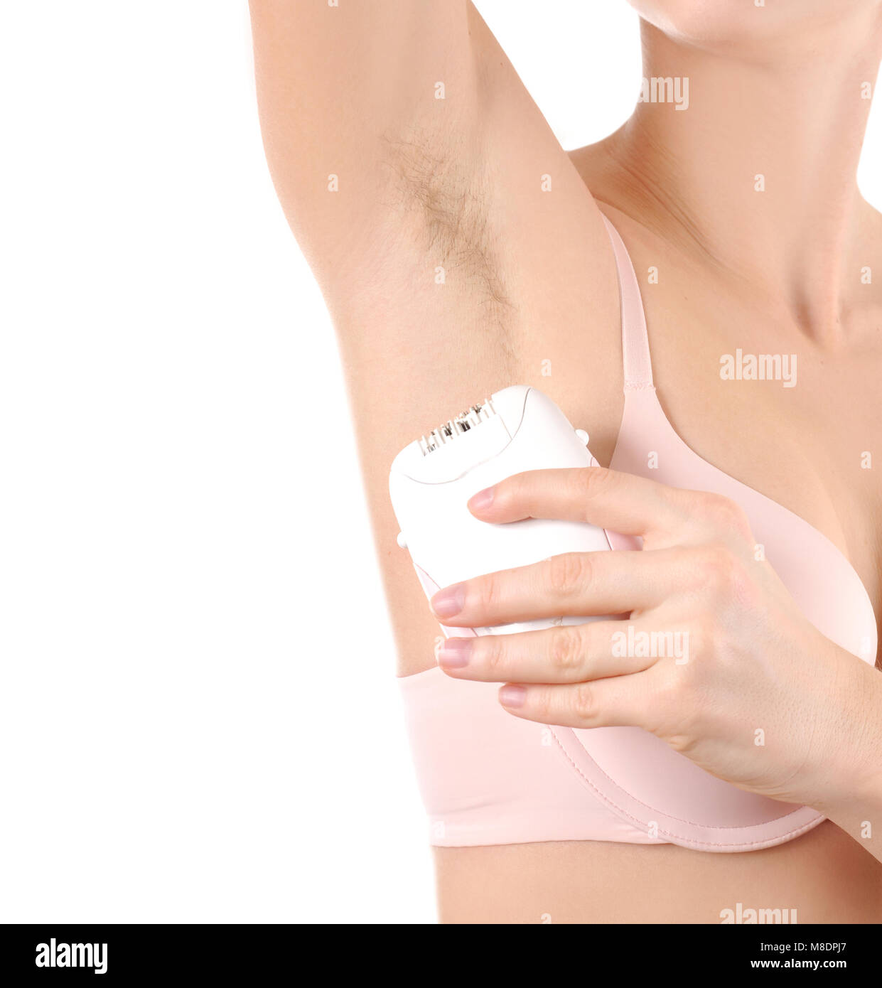 Woman with hairy armpits. Depilation, hair removal and skin care concept. Stock Photo