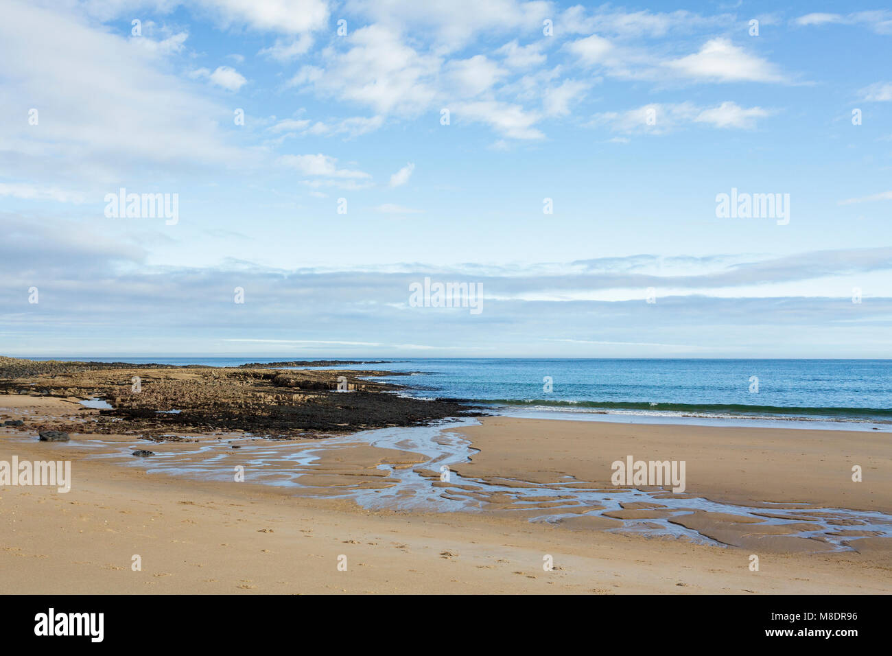 A small bay in between Beadnell Bay and Low Newton by-the-Sea Stock Photo