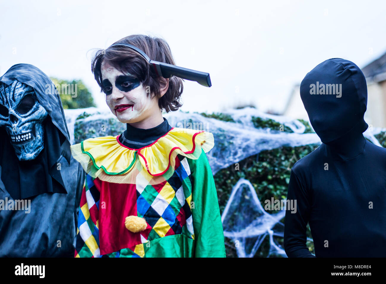 Young boys dressed in halloween costume, outdoors Stock Photo