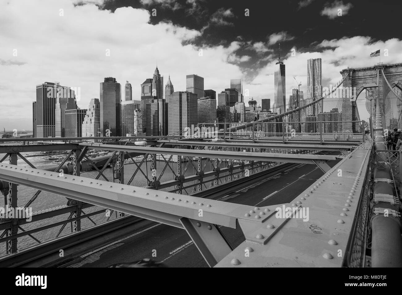 View of Brooklyn Bridge and skyscrapers, B&W, New York, USA Stock Photo