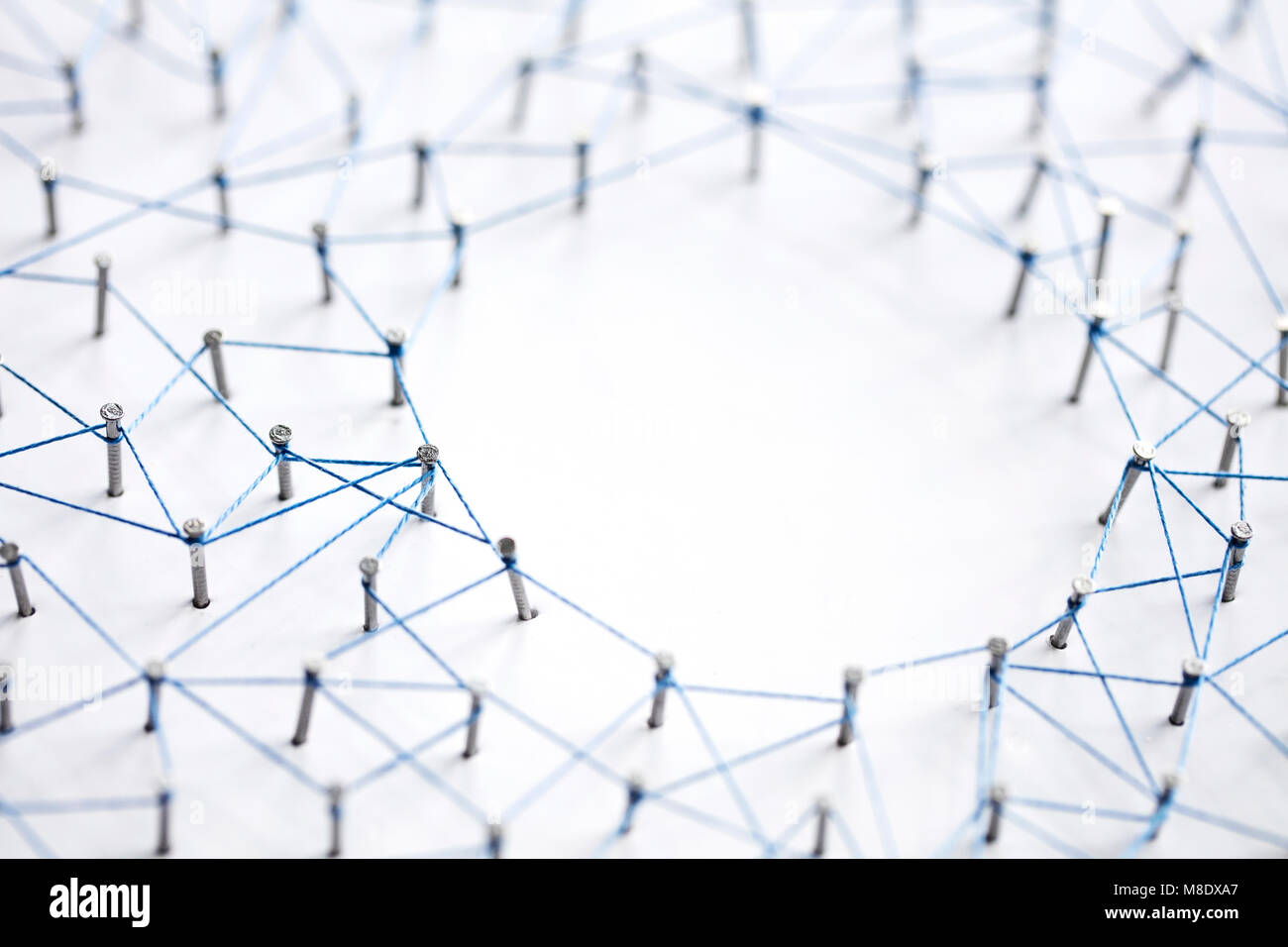 A large grid of pins connected with string. Communication, technology ...