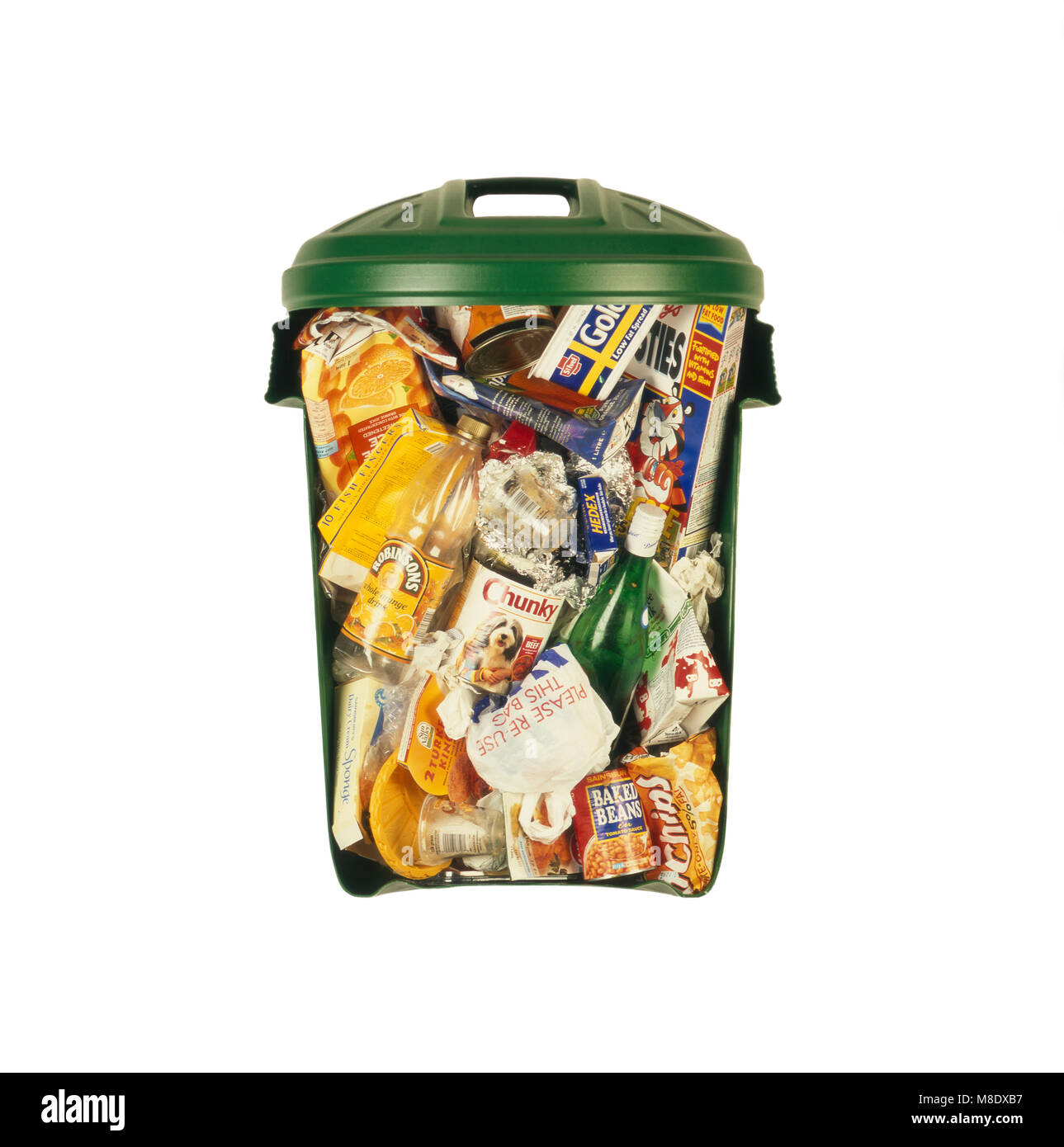 Dustbin full of household rubbish - cutaway Stock Photo
