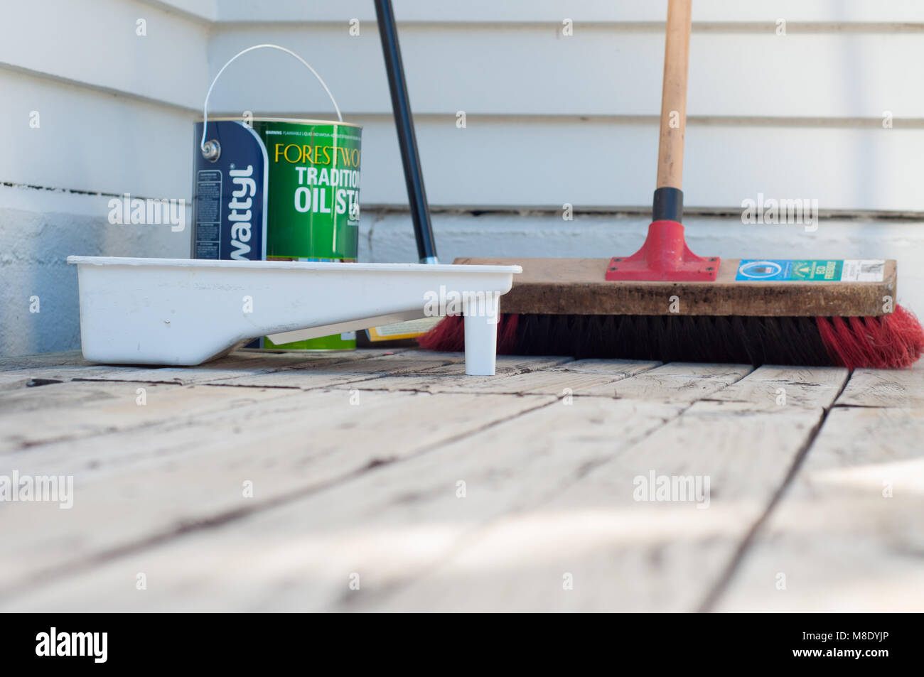 Broom Paint Tray And Deck Stain Stock Photo Alamy