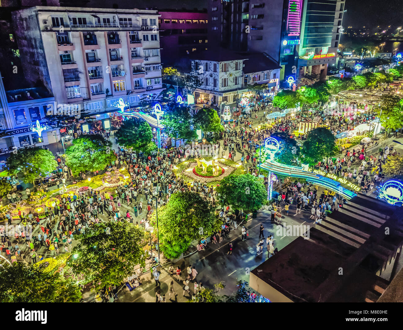 Crowds of people gather to celebrate Chinese Lunar New Year, Ho Chi Minh City, Saigon, Vietnam