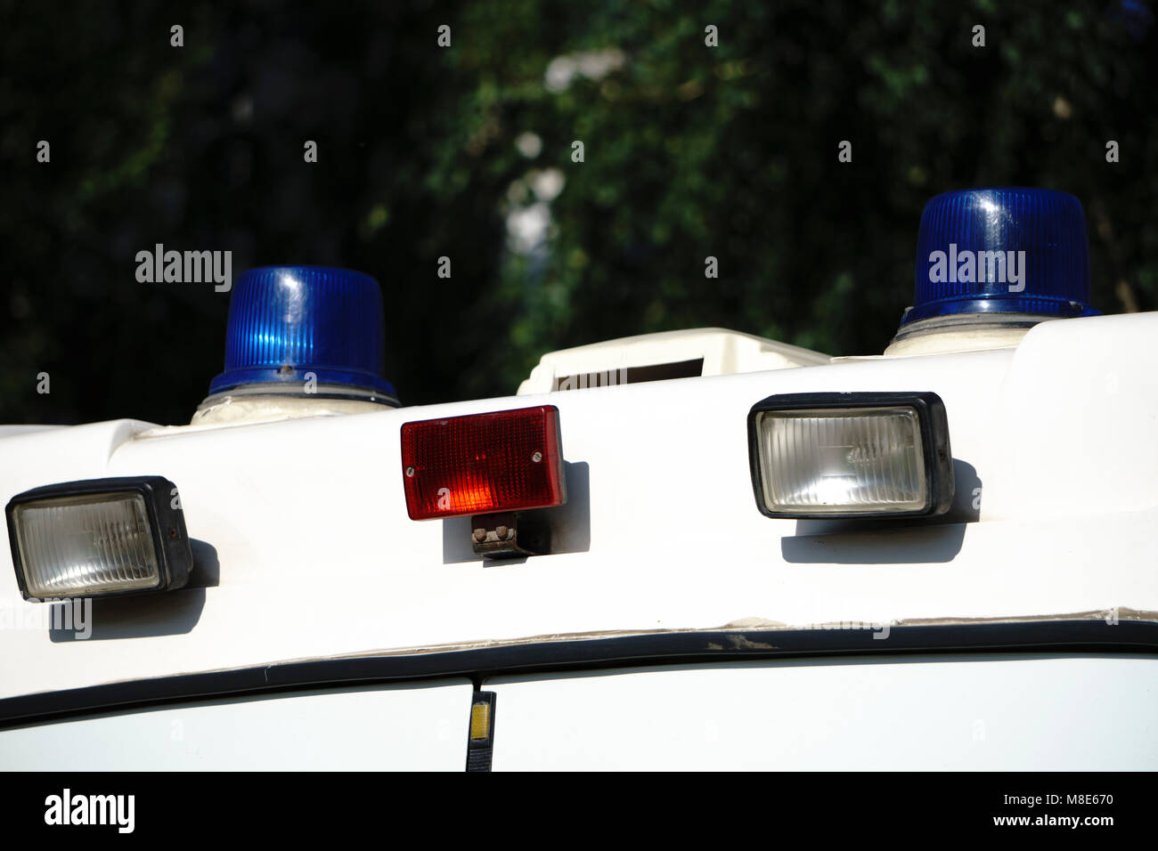 Roof mounted blue light-bar police car Stock Photo