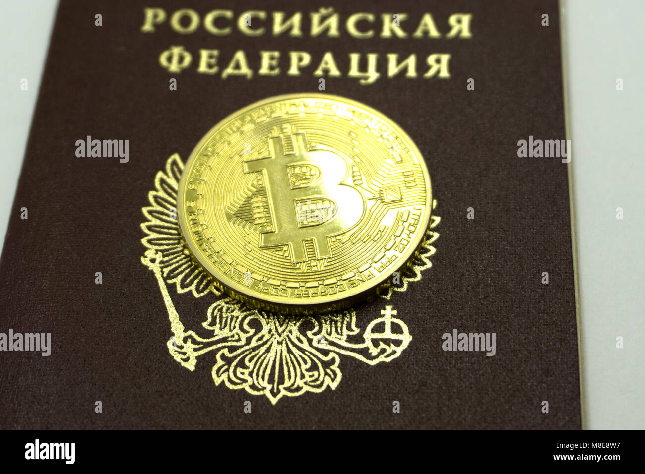 Bitcoin coins and passport on white background Stock Photo Alamy