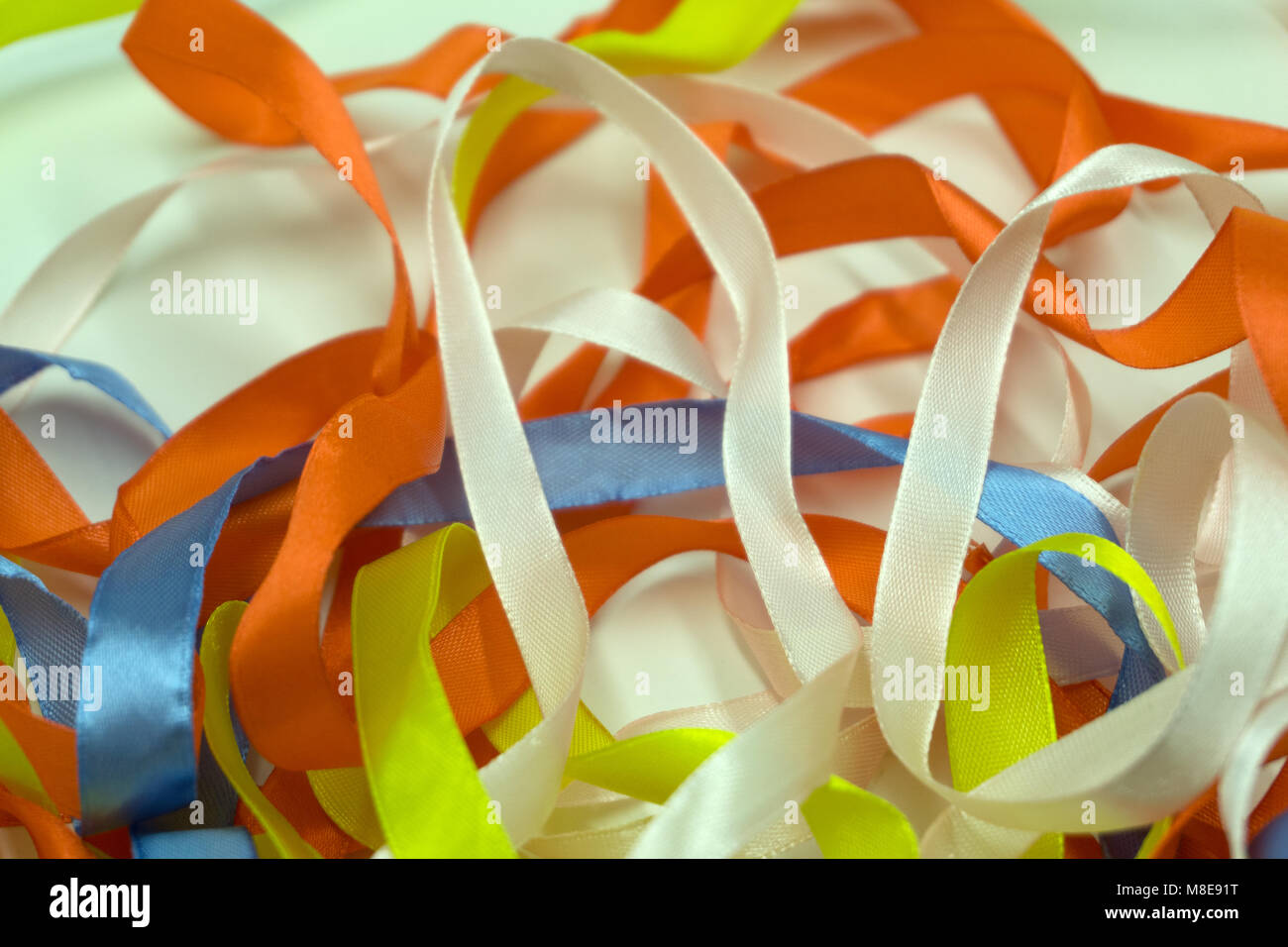 different colored ribbons carelessly spread Stock Photo - Alamy