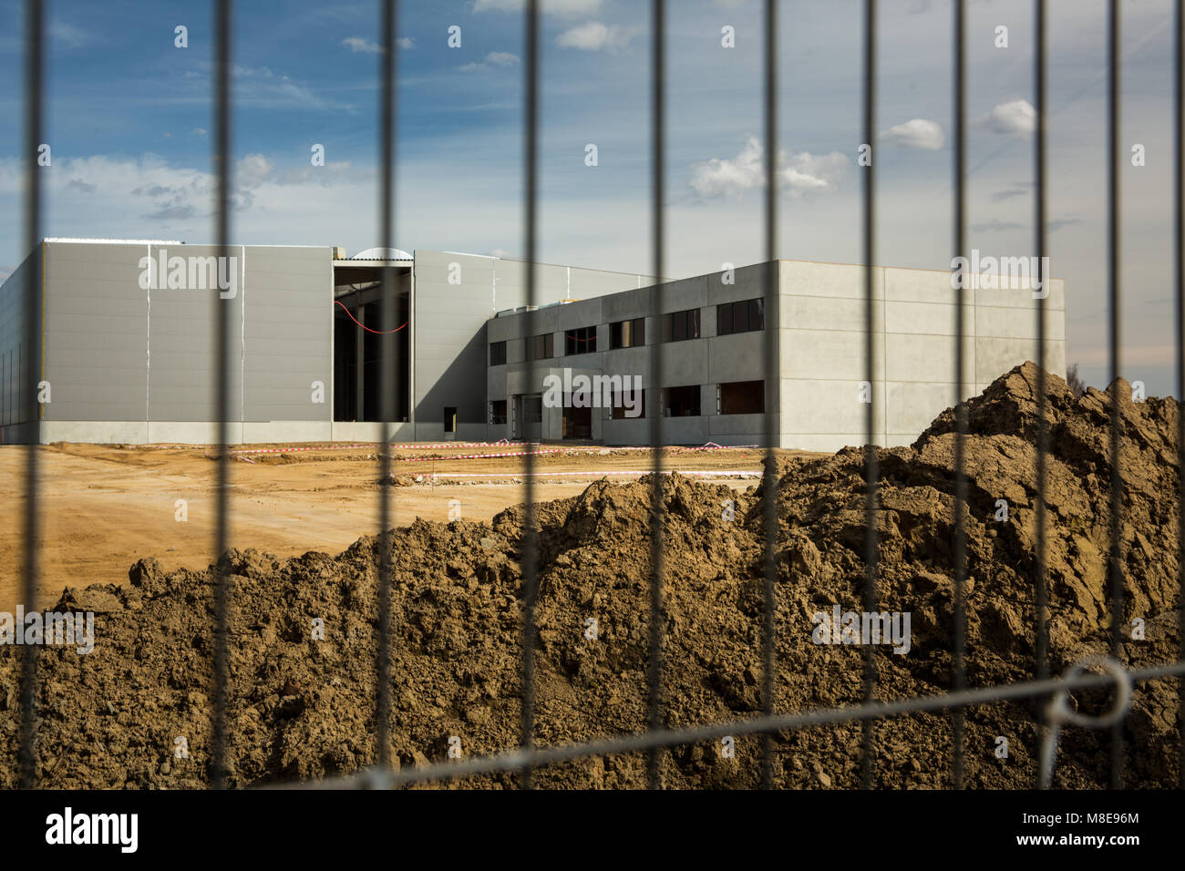 Construction site with a fence around it Stock Photo - Alamy