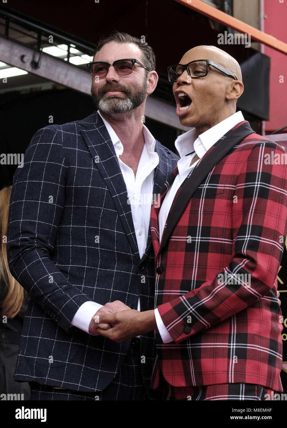 Los Angeles, California, USA. 16th Mar, 2018. RuPaul and husband, Georges LeBar pose with his star on the Hollywood Walk of Fame following a ceremony on Friday, March 16, 2018, in Los Angeles. Credit: Ringo Chiu/ZUMA Wire/Alamy Live News Stock Photo