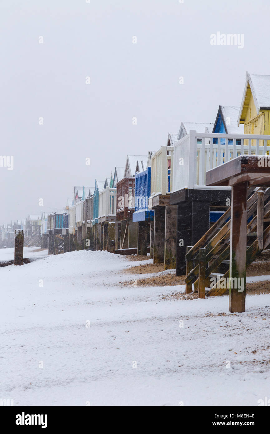 Essex, UK, 17 Mar 2018. Heavy snowfall early on Saturday morning started to blanket the far south of Essex near Southend-on-Sea. The heavy snow covered the beach and huts in Thorpe Bay with few people venturing out. Credit: Timothy Smith/Alamy Live News Stock Photo