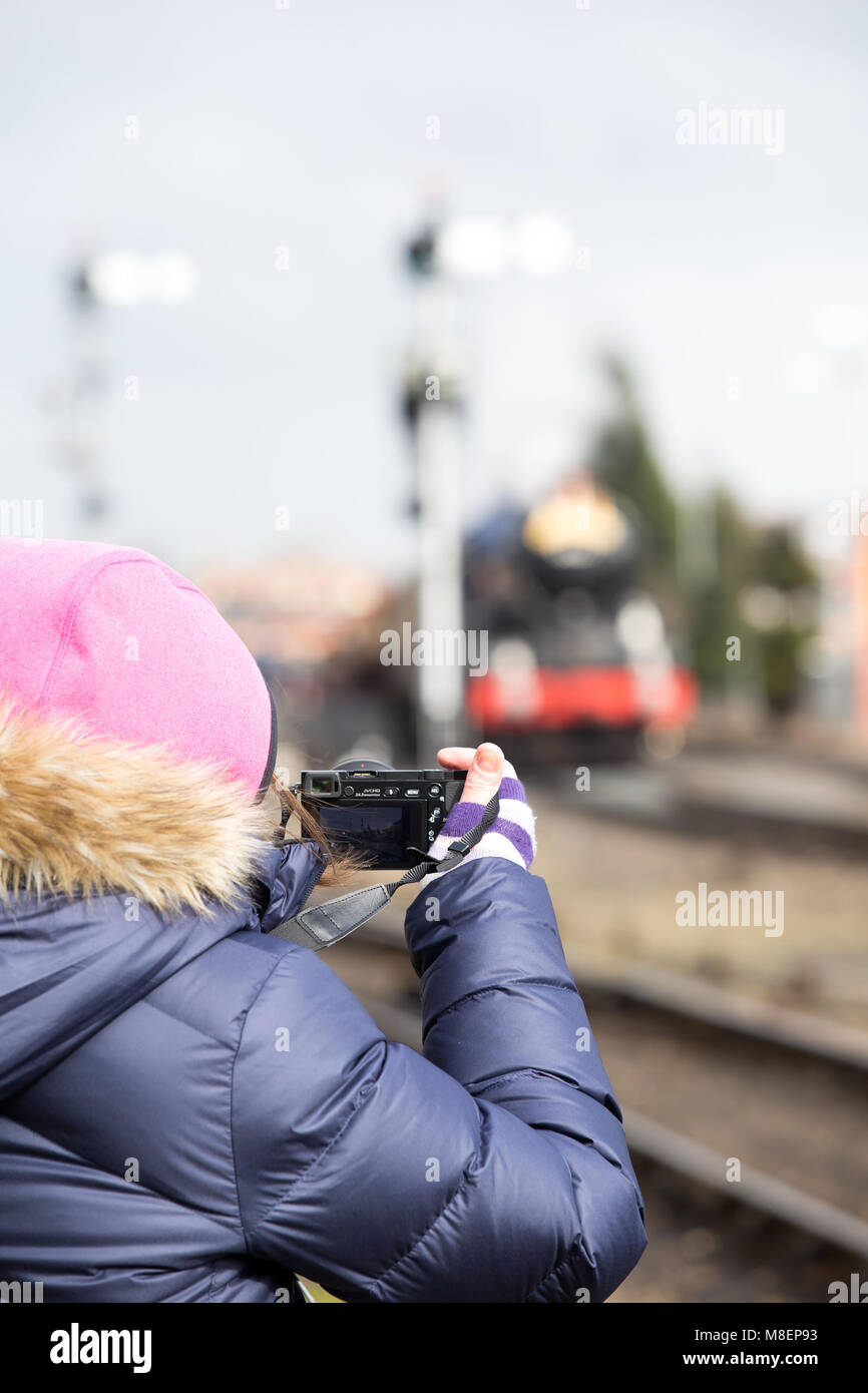 Kidderminster, UK. 17th March, 2018. Severn Valley Railway enthusiasts enjoy taking pictures and travelling on this heritage railway line running between Kidderminster & Bridgnorth. Wintry conditions with sub-zero temperatures and snow have not put trainspotters off indulging in their passion for Britain's steam railway companies. Credit: Lee Hudson/Alamy Live News Stock Photo