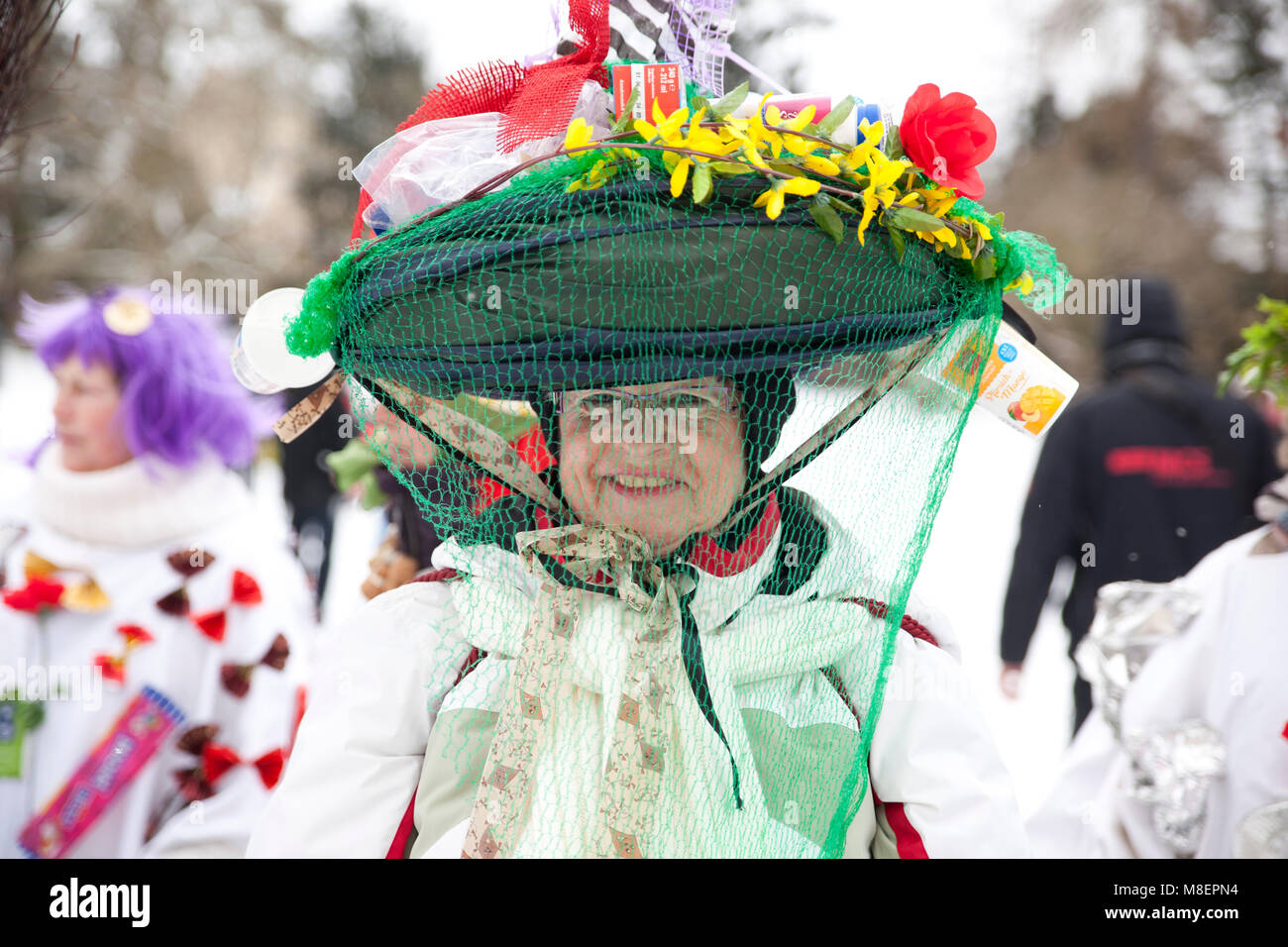 17 March 2018, Germany, Woerlitz: A costumed participant holding takes part in the procession during the 'Fruehlingserwachen' (lit. spring awakening). Photo: Johannes Stein/dpa-Zentralbild/ZB Credit: dpa picture alliance/Alamy Live News Stock Photo