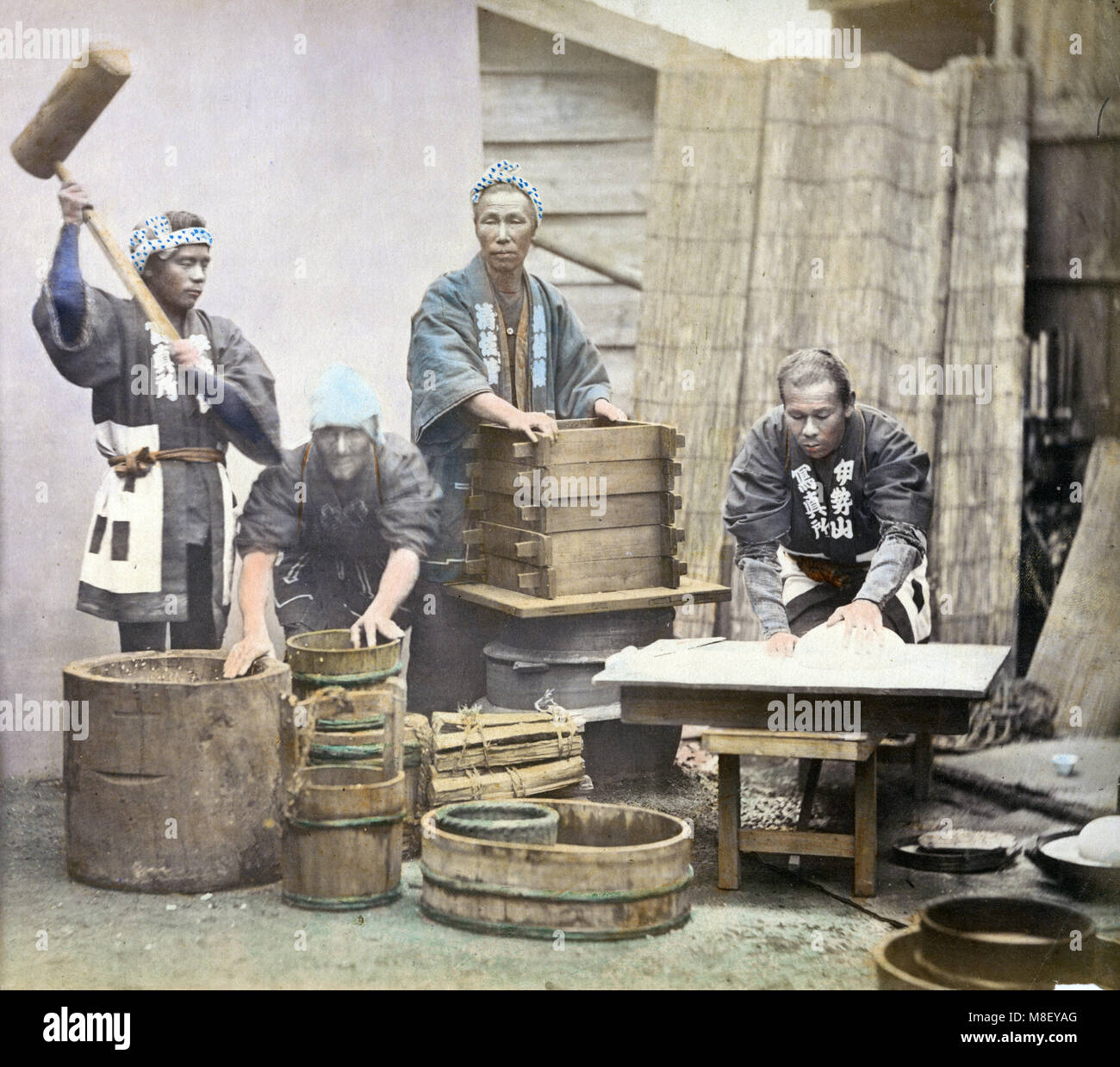 c.1880s Japan - pounding rice Stock Photo