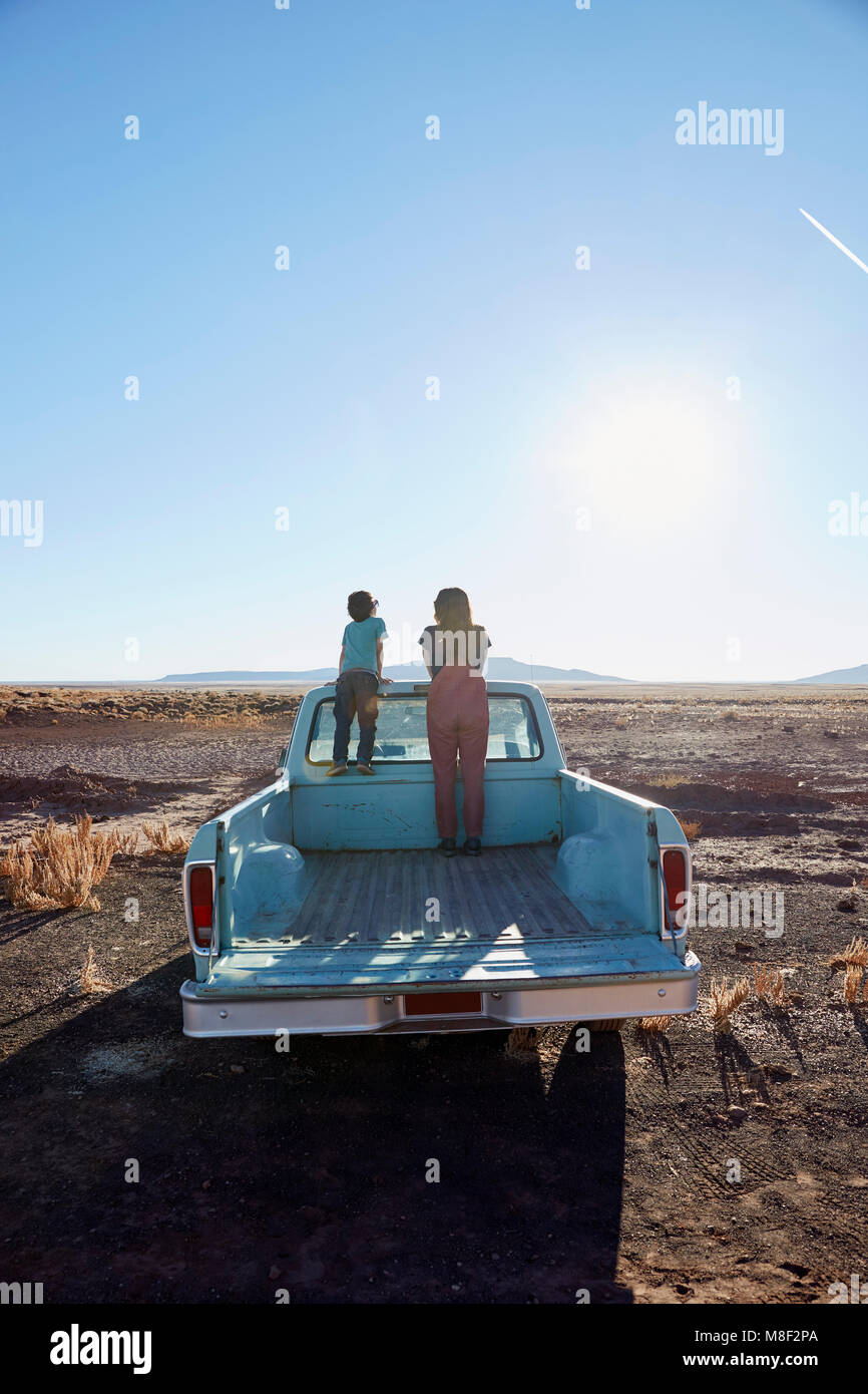 USA, Arizona, Mother with boy (6-7) looking at view from pick-up truck Stock Photo