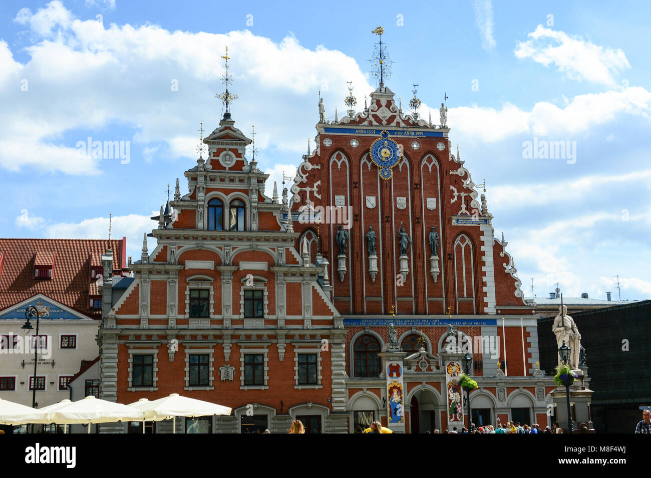 Riga, Latvia - July 30, 2017: The cityscape of the old town of Riga, Latvia. St. Peter's Church and House of the Blackheads. Stock Photo